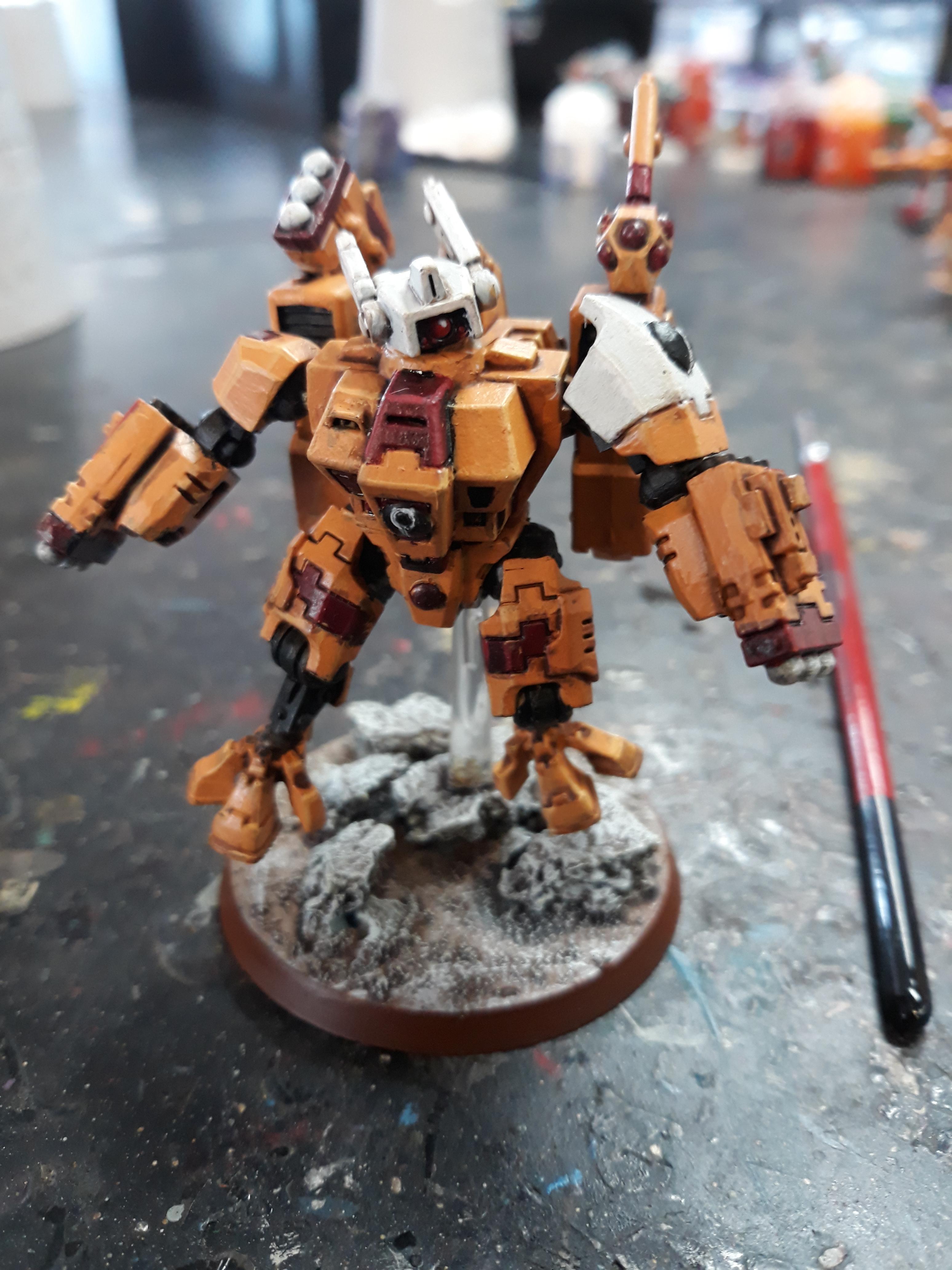 Crisis Commander done in Tau Sept colours. More a missle platform and