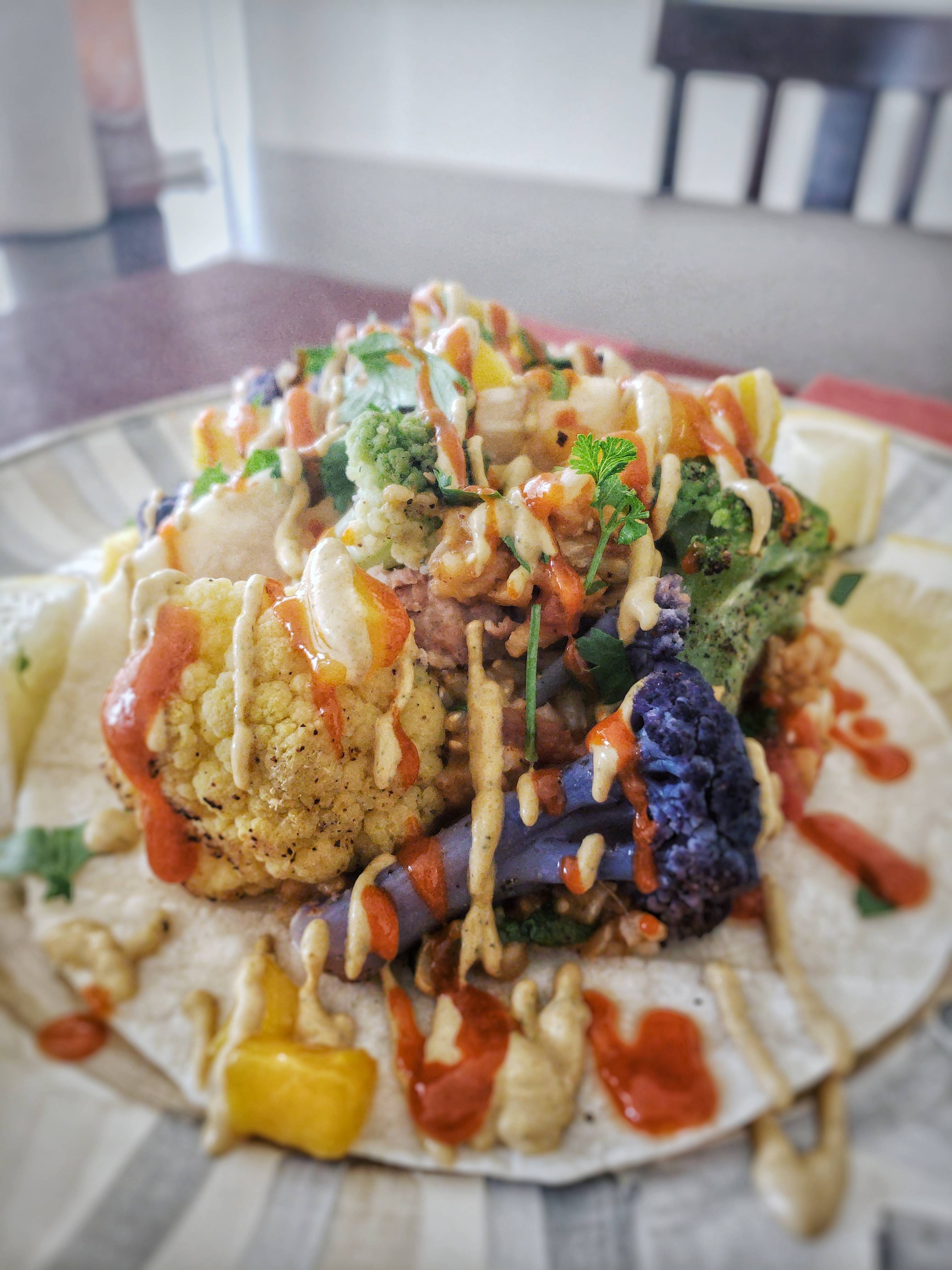 Roasted Cauliflower Tacos w/ Pinto Beans, Rice, Mango and Cashew Sauce