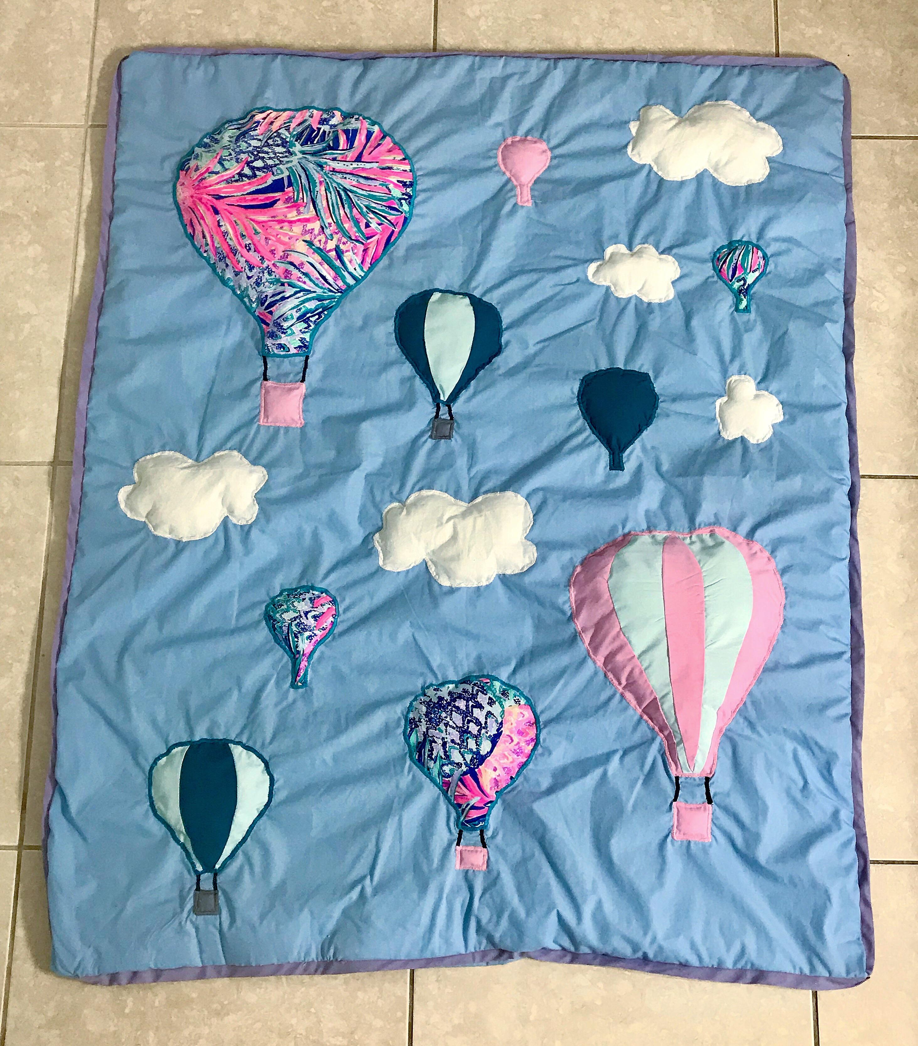 Self drafted hot air balloon baby blanket I made for my daughter, who
