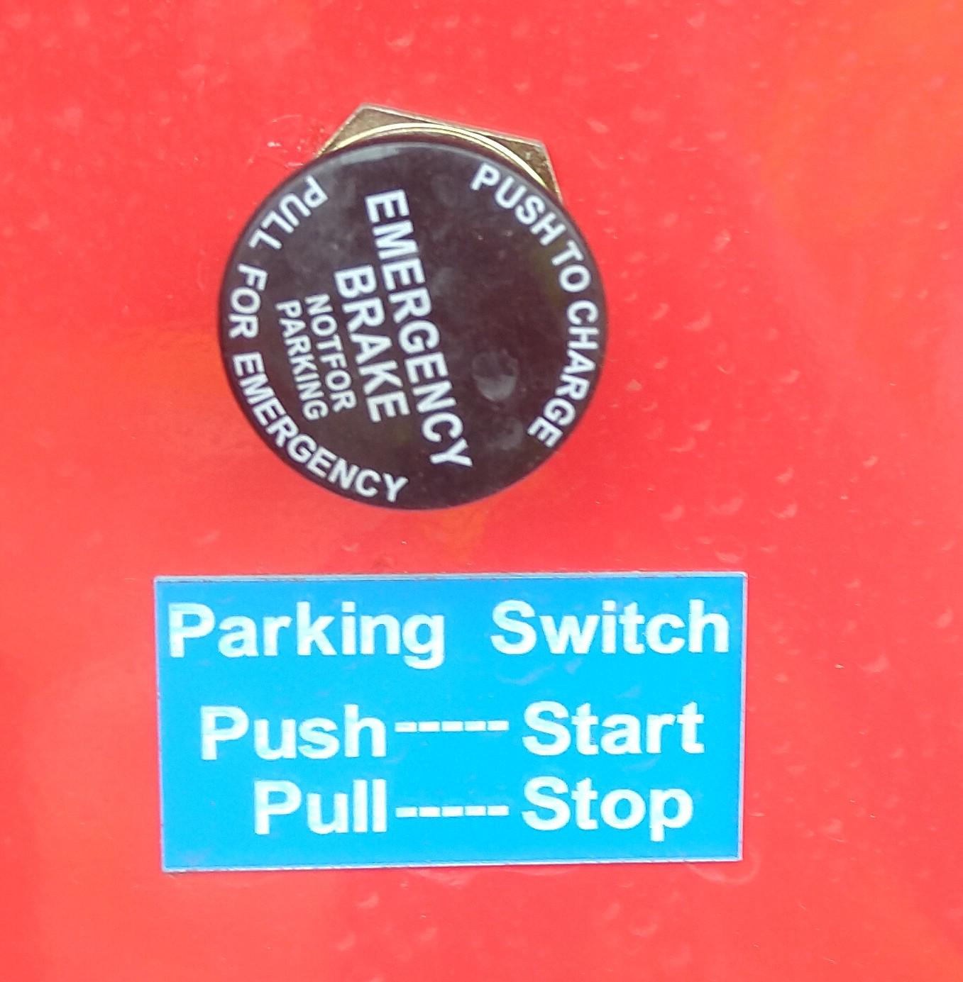 This sign is being put on the emergency brake on 20 truck trailers per