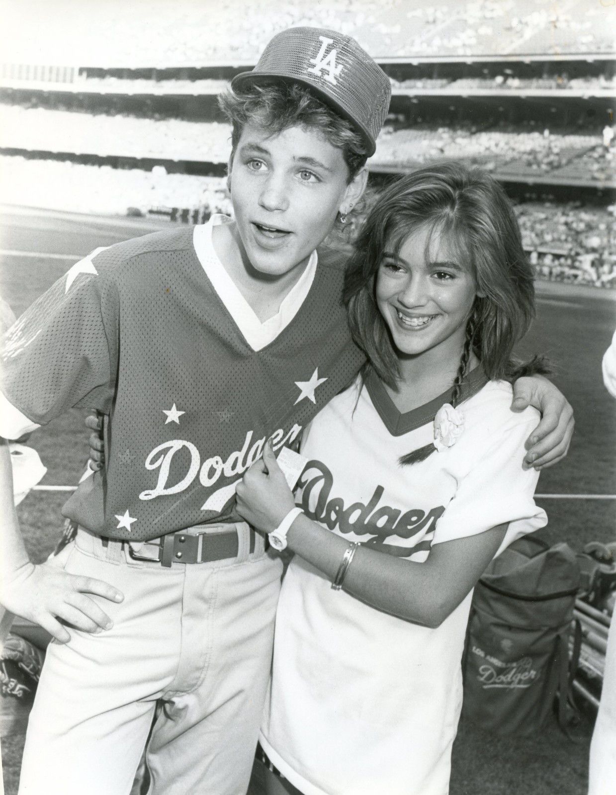 Corey Haim and Alyssa Milano at a Dodgers game, 1987. r/OldSchoolCool