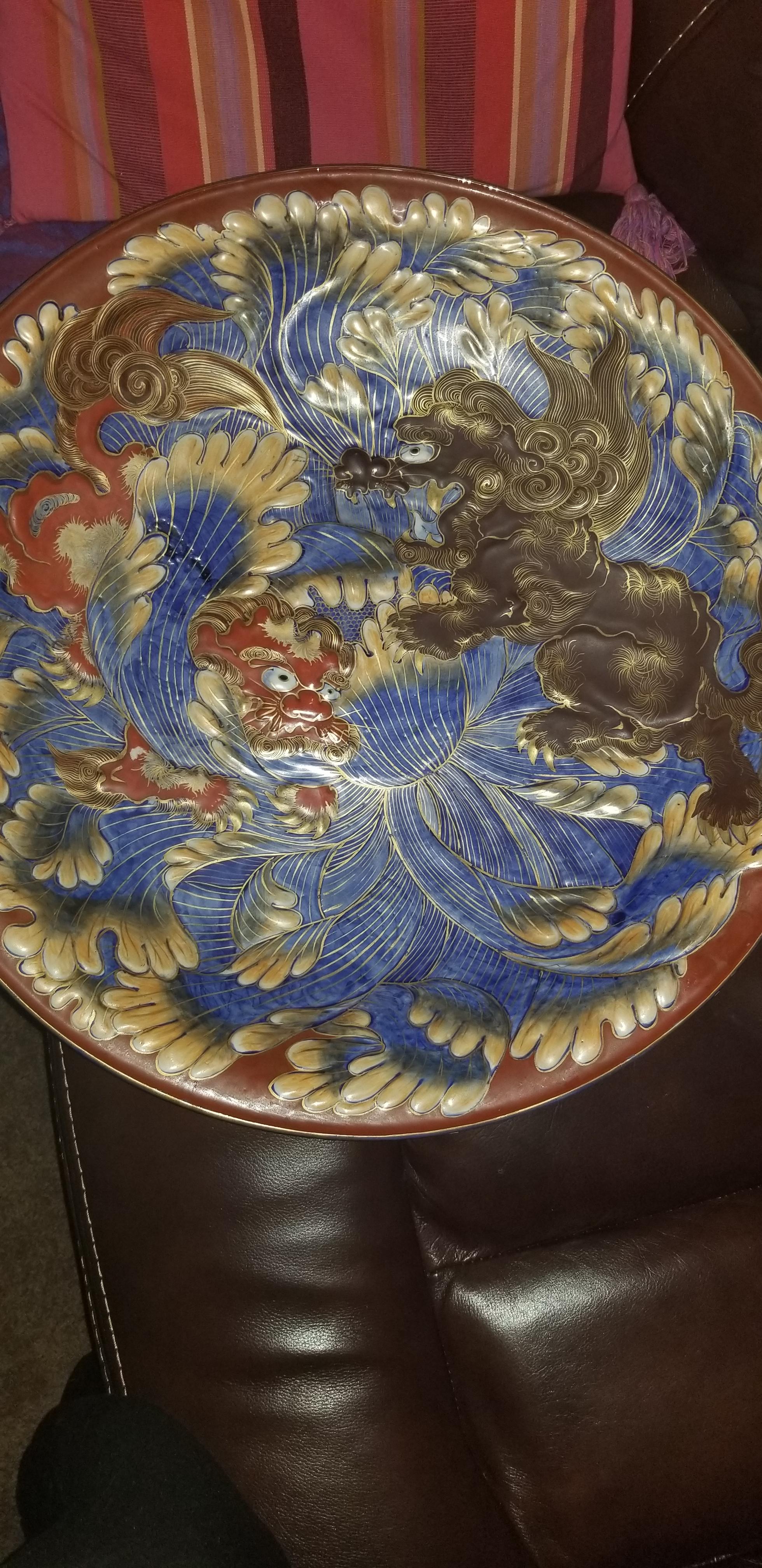 Early Japanese 24" bowl. Raised sculpting, gold inlay and very heavy