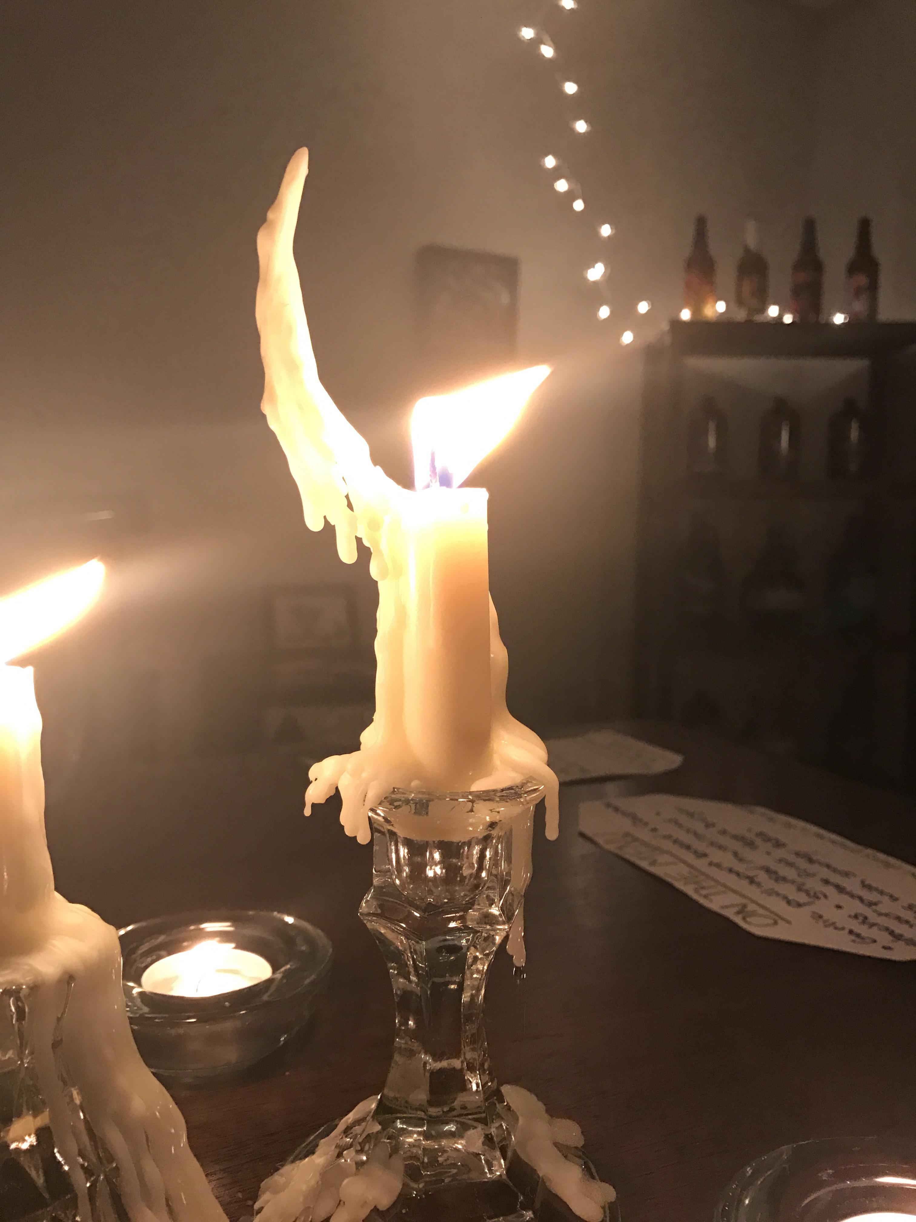 Our candle burned off into a near perfect crescent moon r