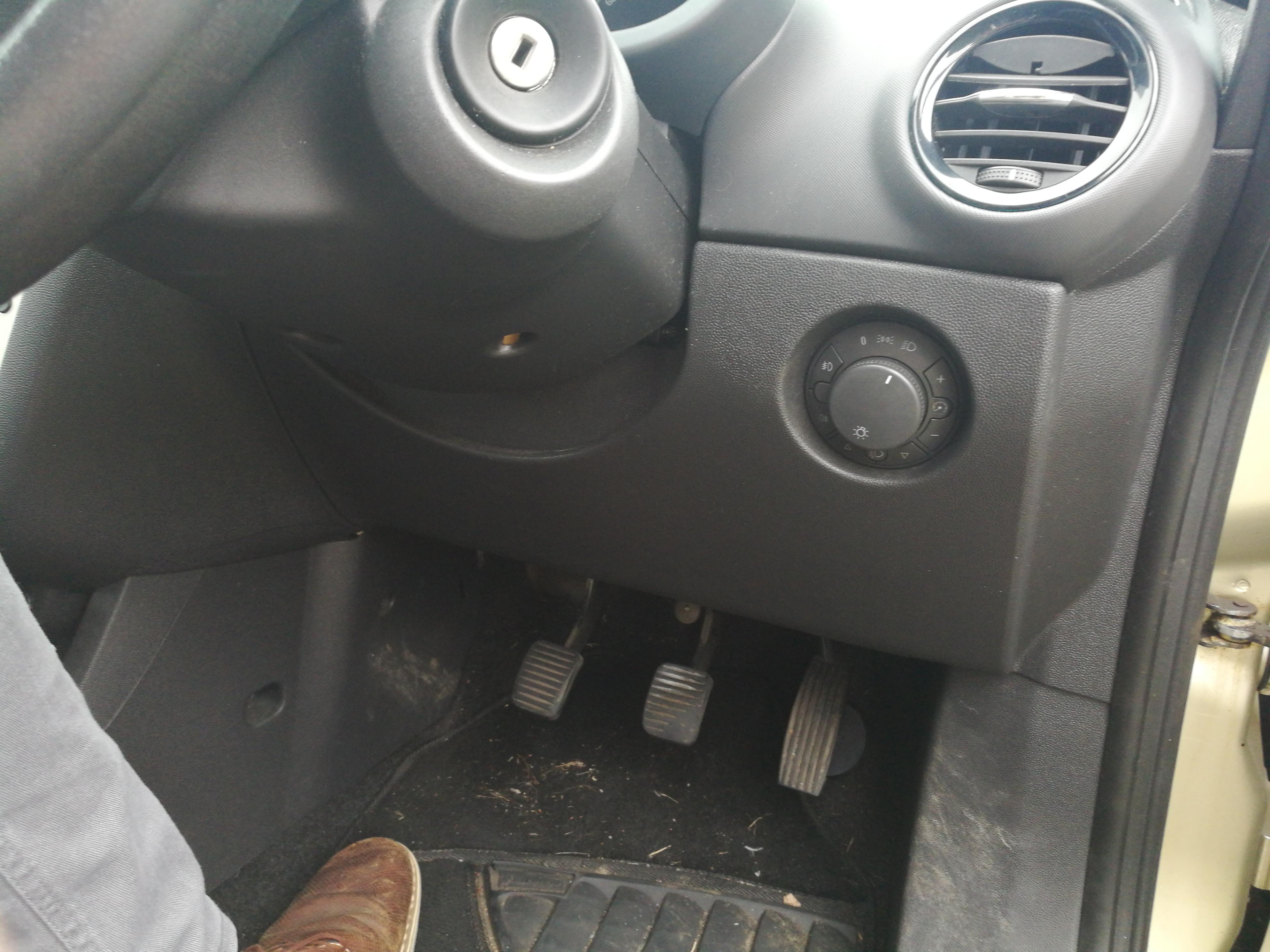 Opel Corsa D 2007. How do I remove this thing to access the pedals to