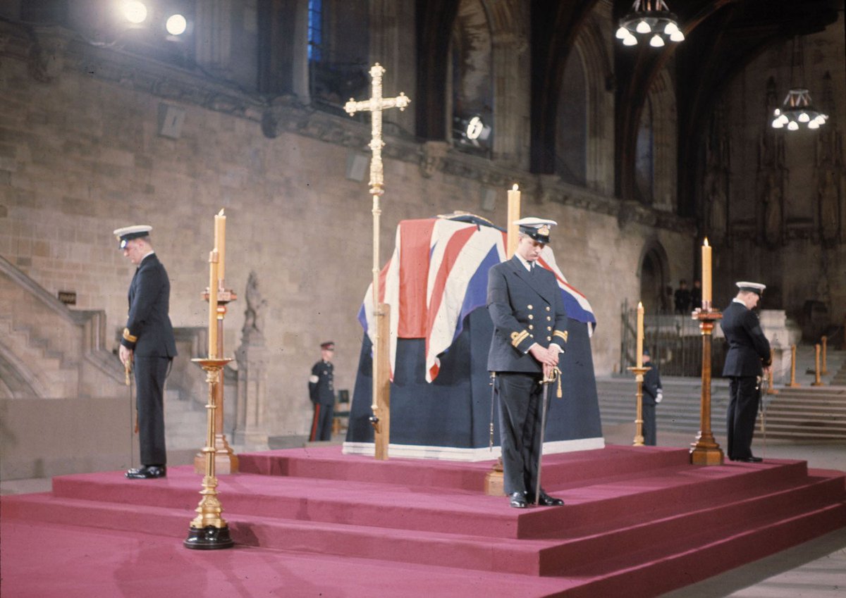 British Naval Officers stand vigil by the coffin of Sir Winston Churchill at Westminster Hall