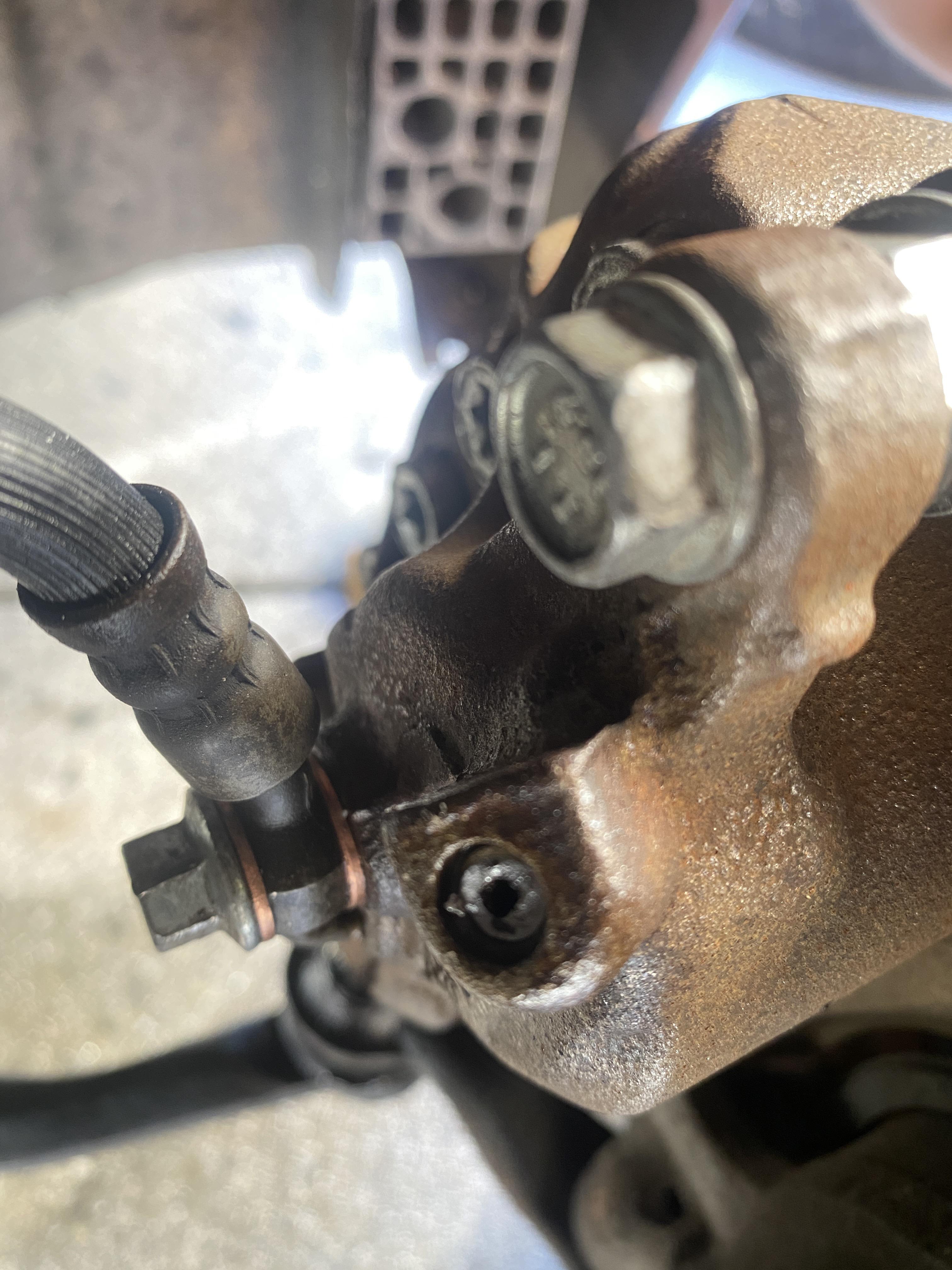 Tightened bleeder valve and part snapped off... r/MechanicAdvice