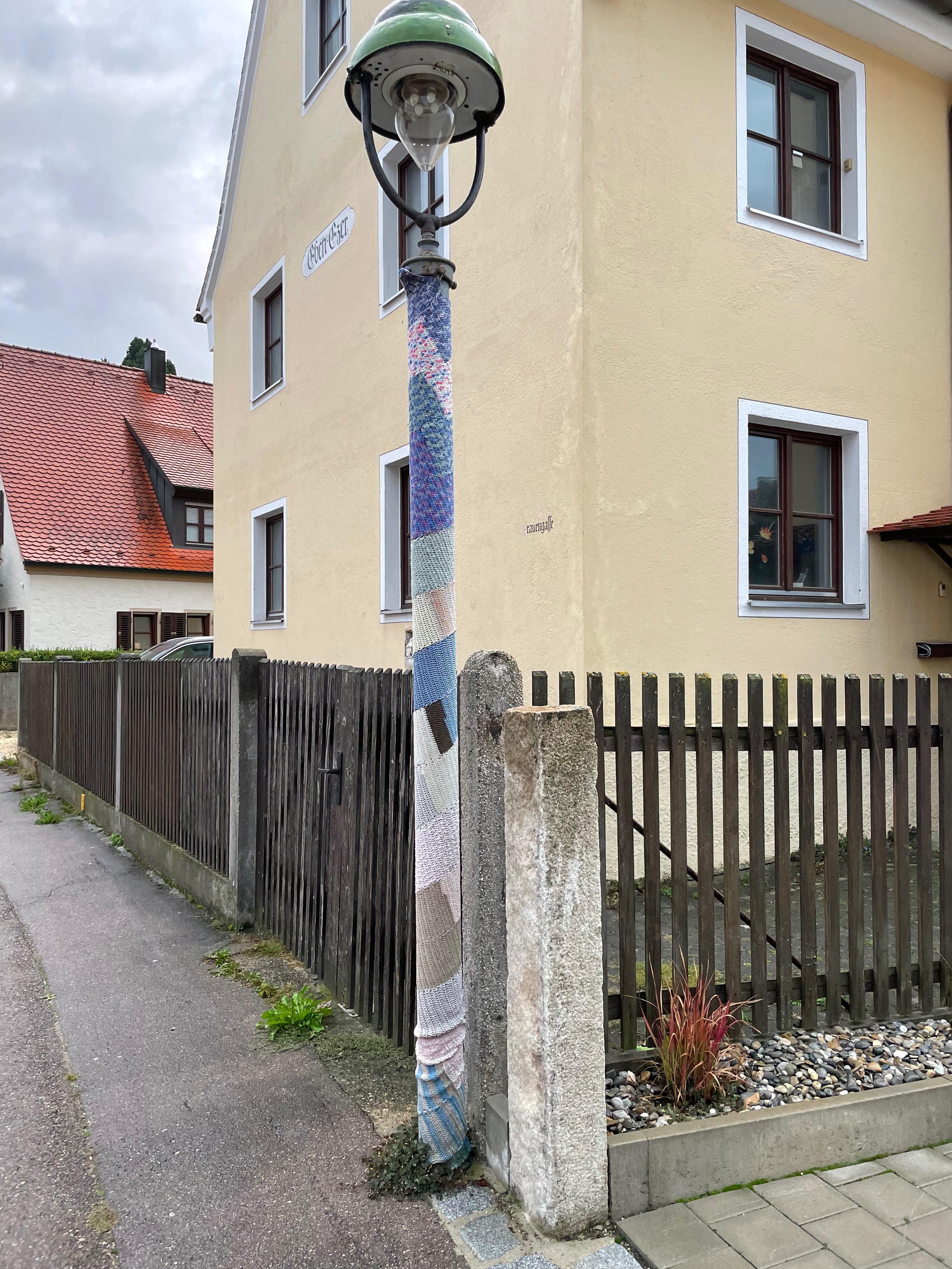 Streetlamp covered for the cold winter in Germany r/mildlyinteresting