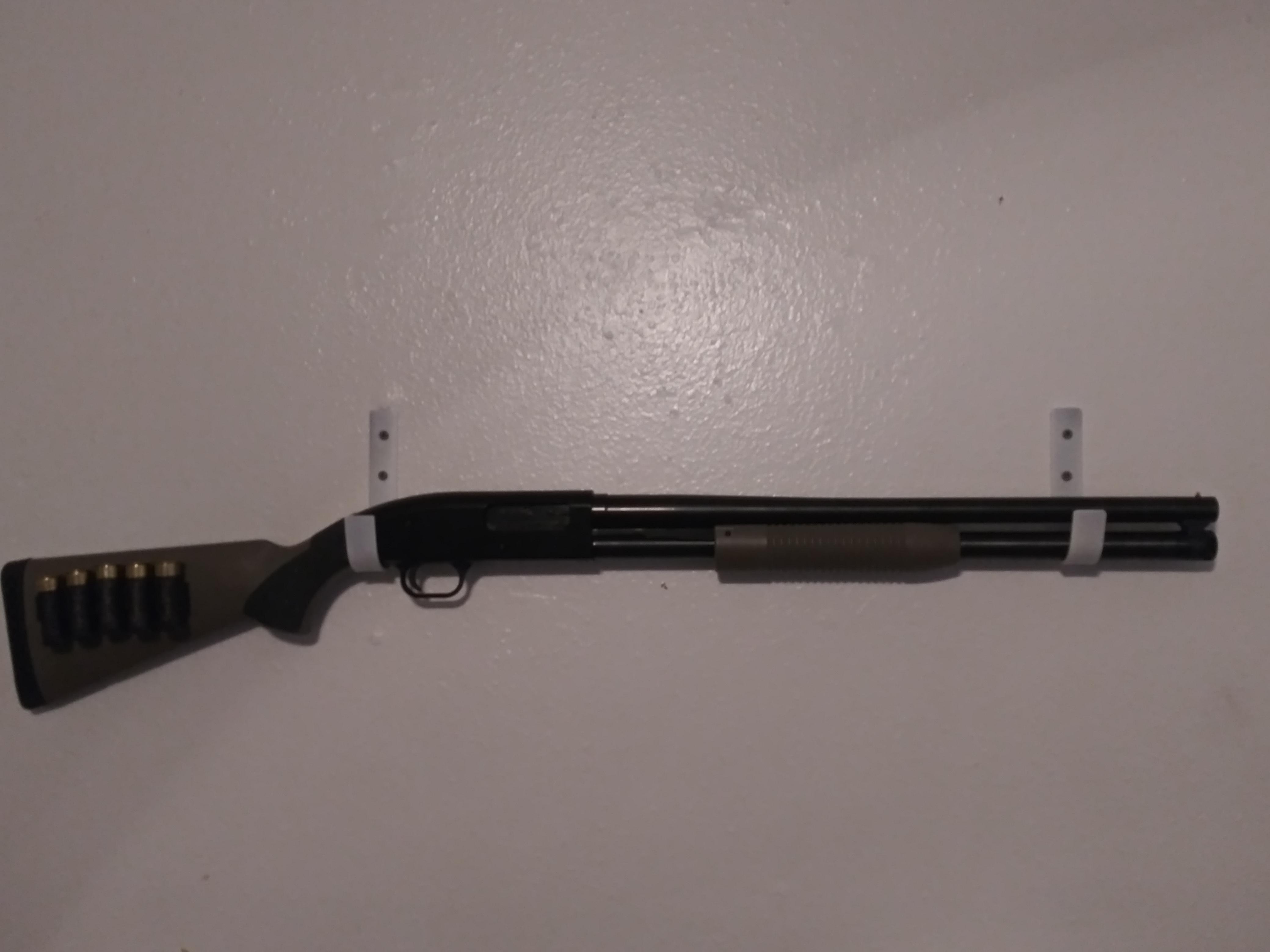 Decided I wanted some simple hooks to mount my shotgun on the wall