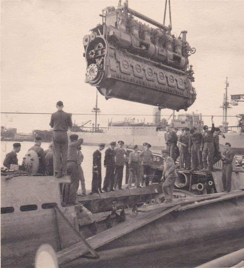 Moving the Diesel engine of German U Boat U-593. U-593 was sunk on 13