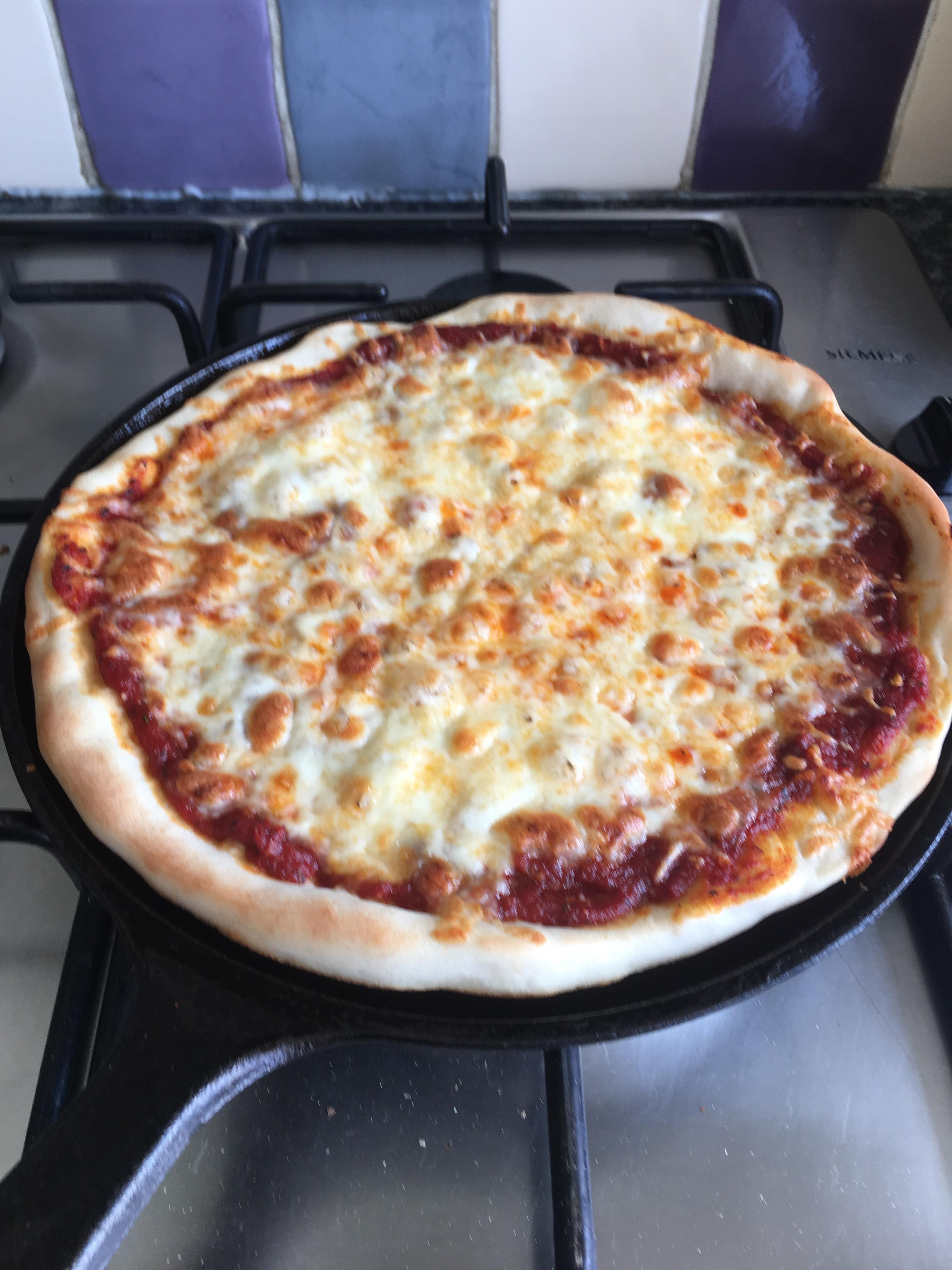 My cast iron pizza r/Pizza