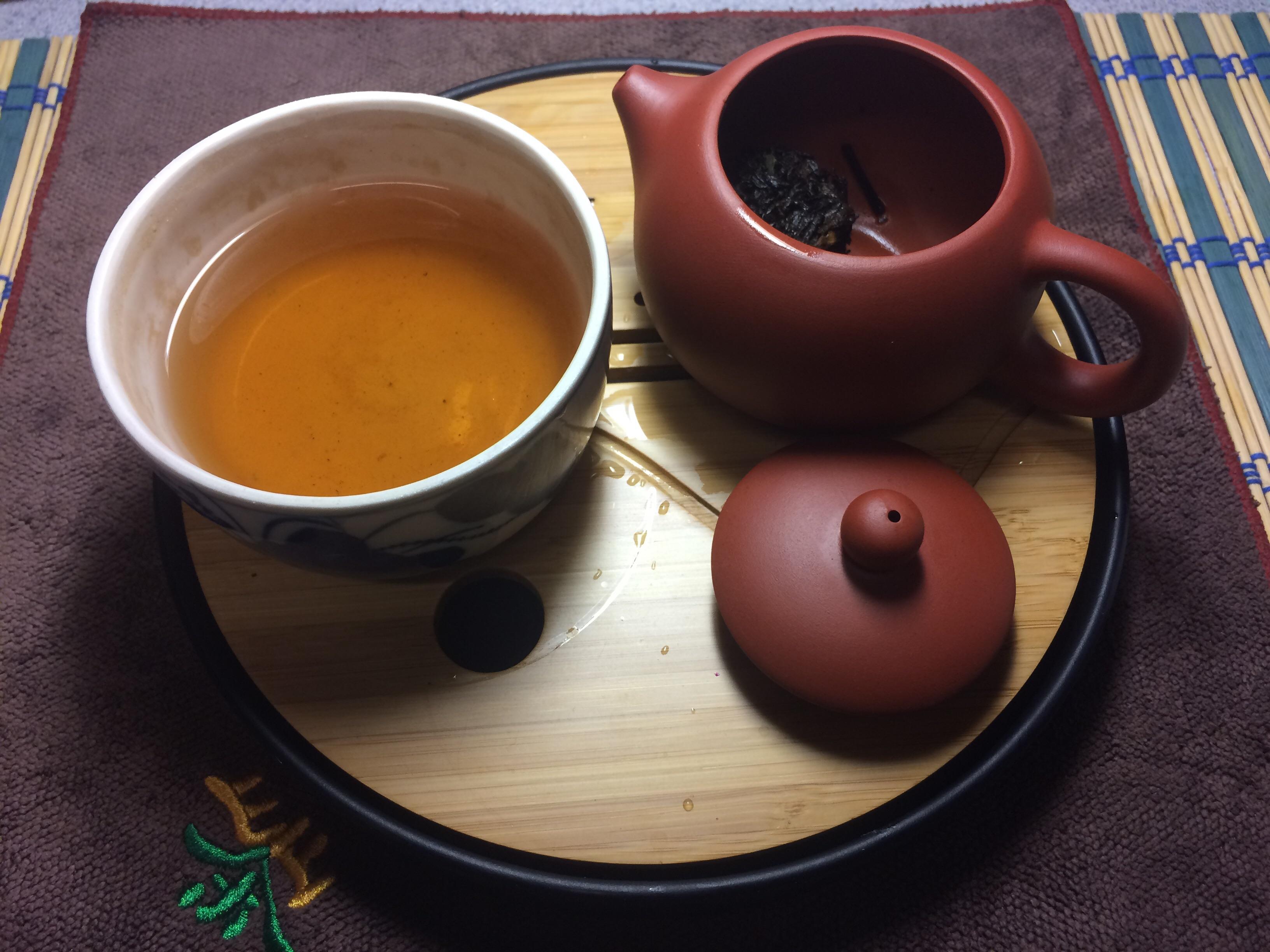 First pot of the work day and the first steep in a virgin Yixing. r/tea