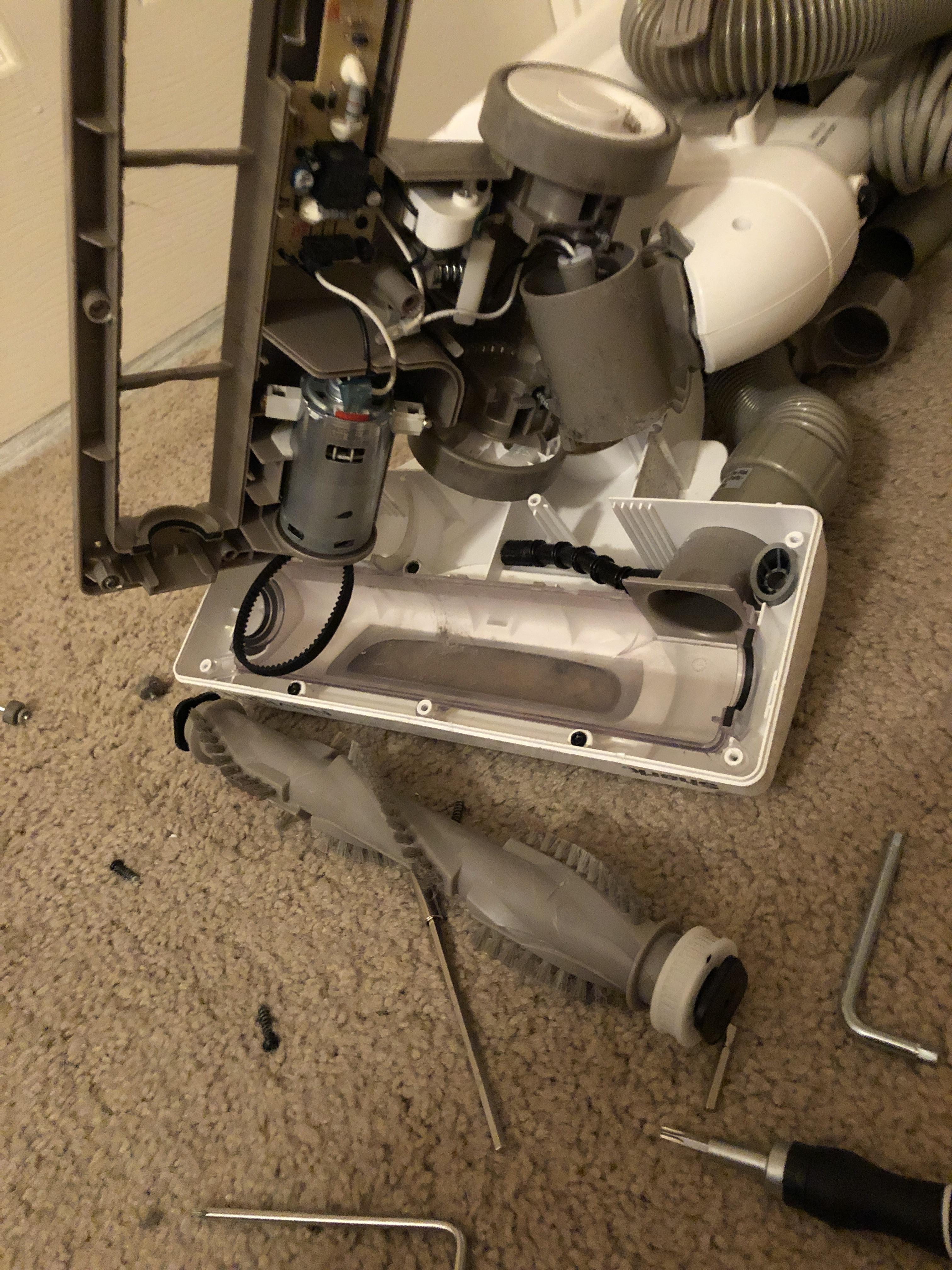 The amount of disassembly required to clean the brush roller in this