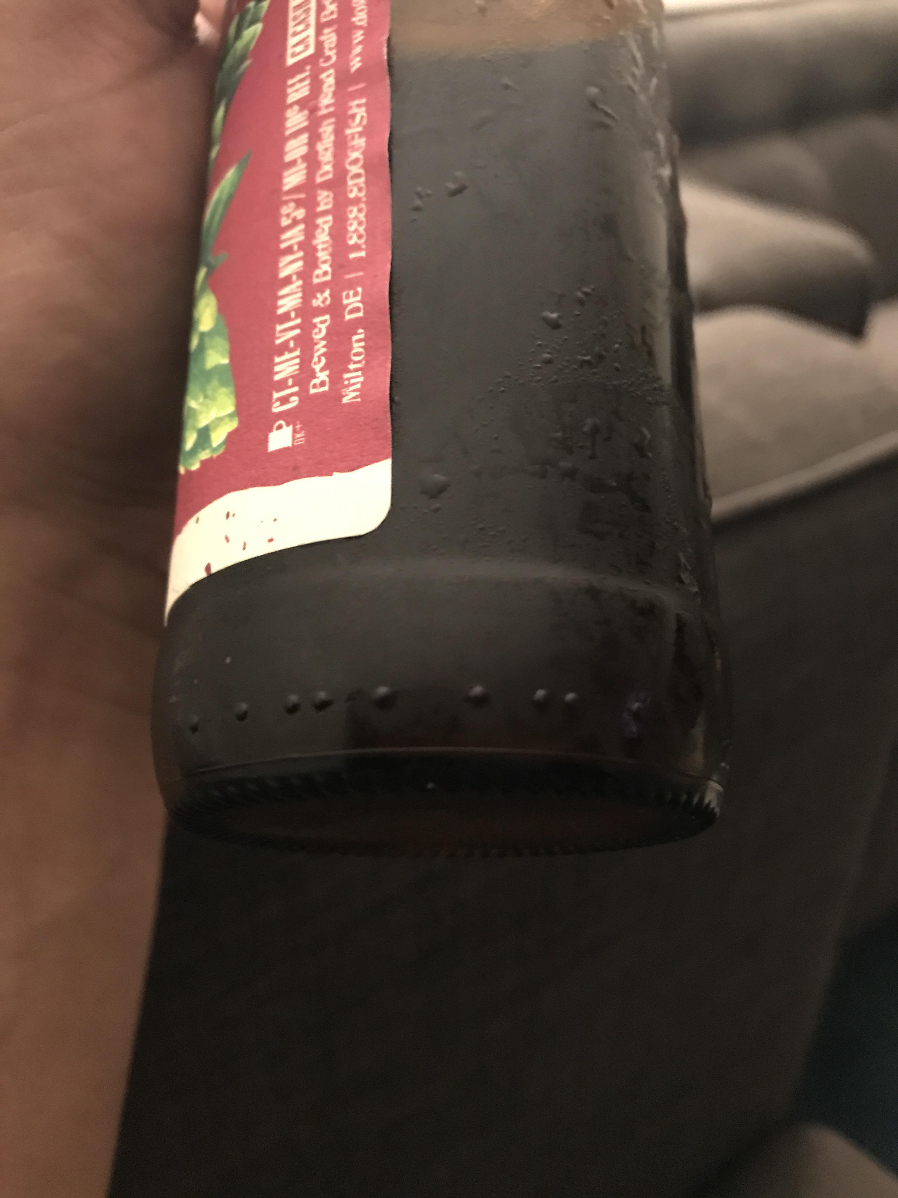 What are these raised dots on the bottom of this beer bottle? It is a