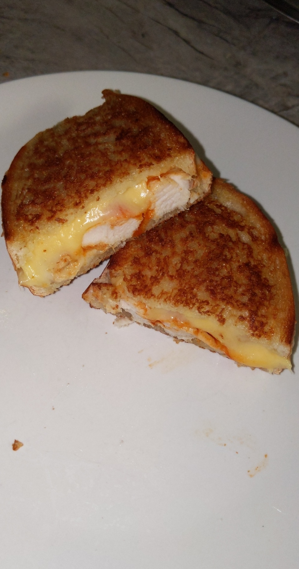 Gouda, provolone, cholula, and sauteed chicken melt r/melts