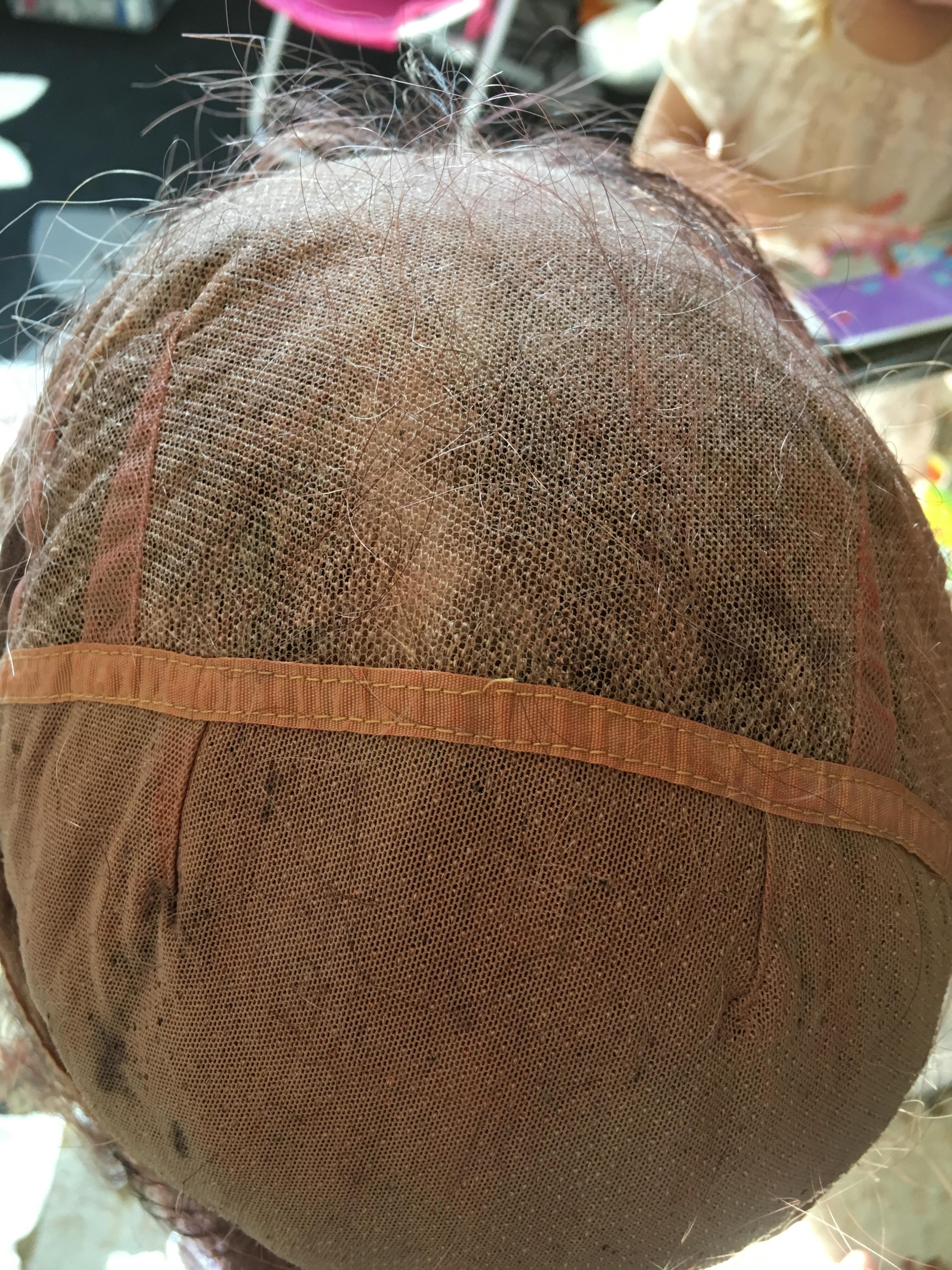 The hair keeps coming through the lace cap to the wrong side. I’ve