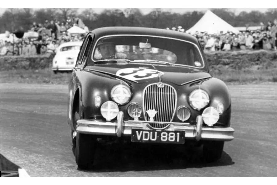 England's first World Champion Mike Hawthorn behind the wheel of an