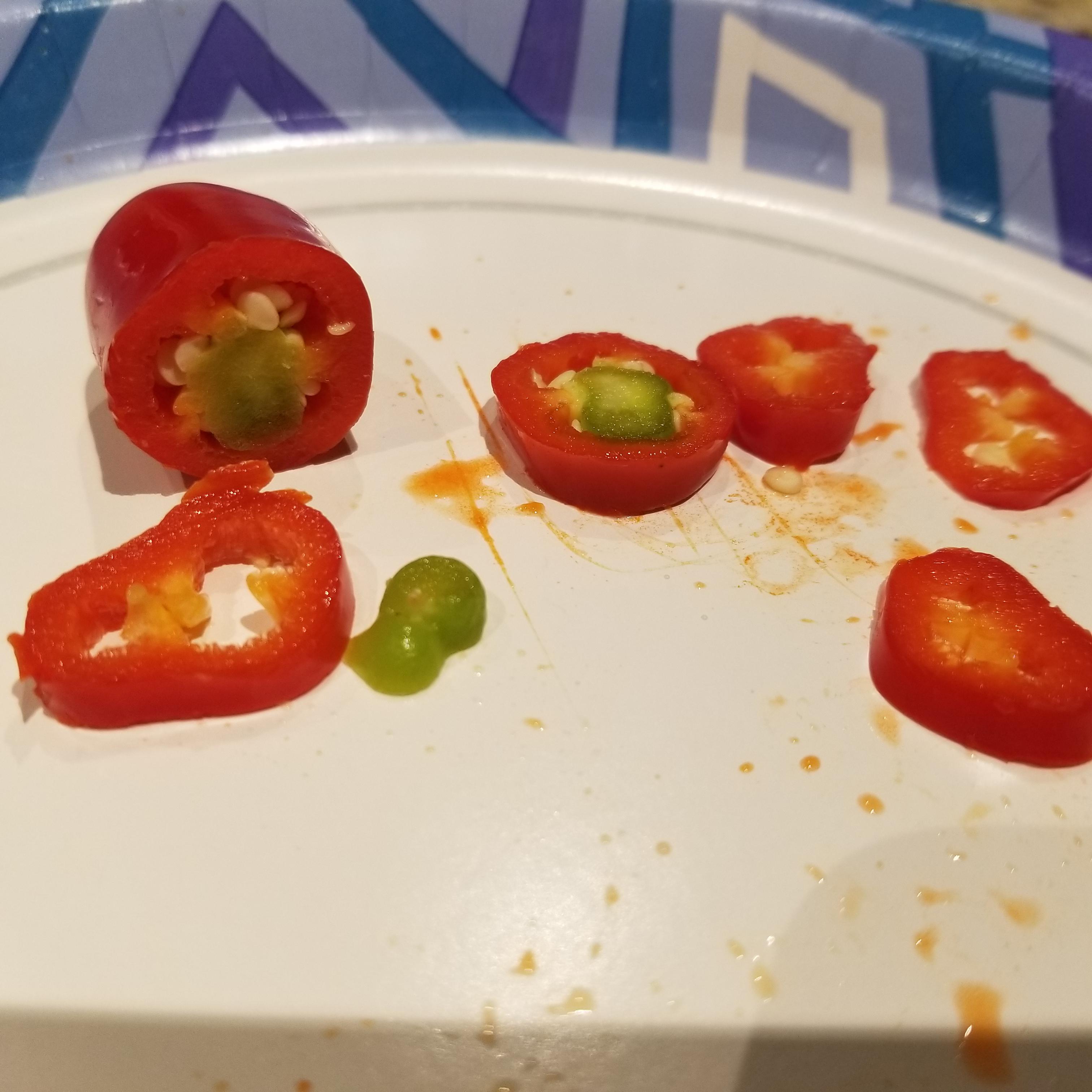 This red jalapeno I grew was pregnant with a green one r