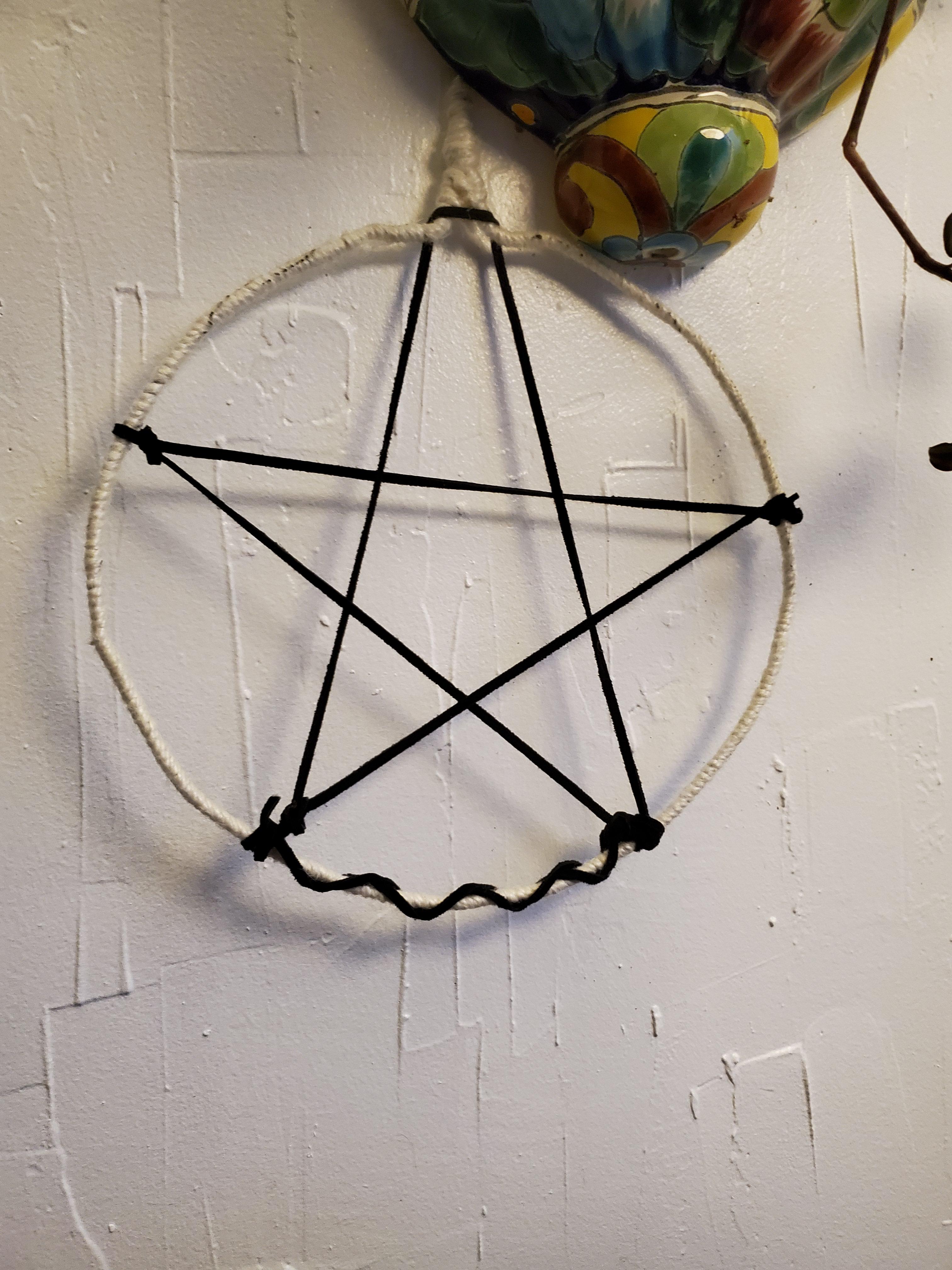 This is a very easy craft! Bend a wire hanger into a circle, wrap in