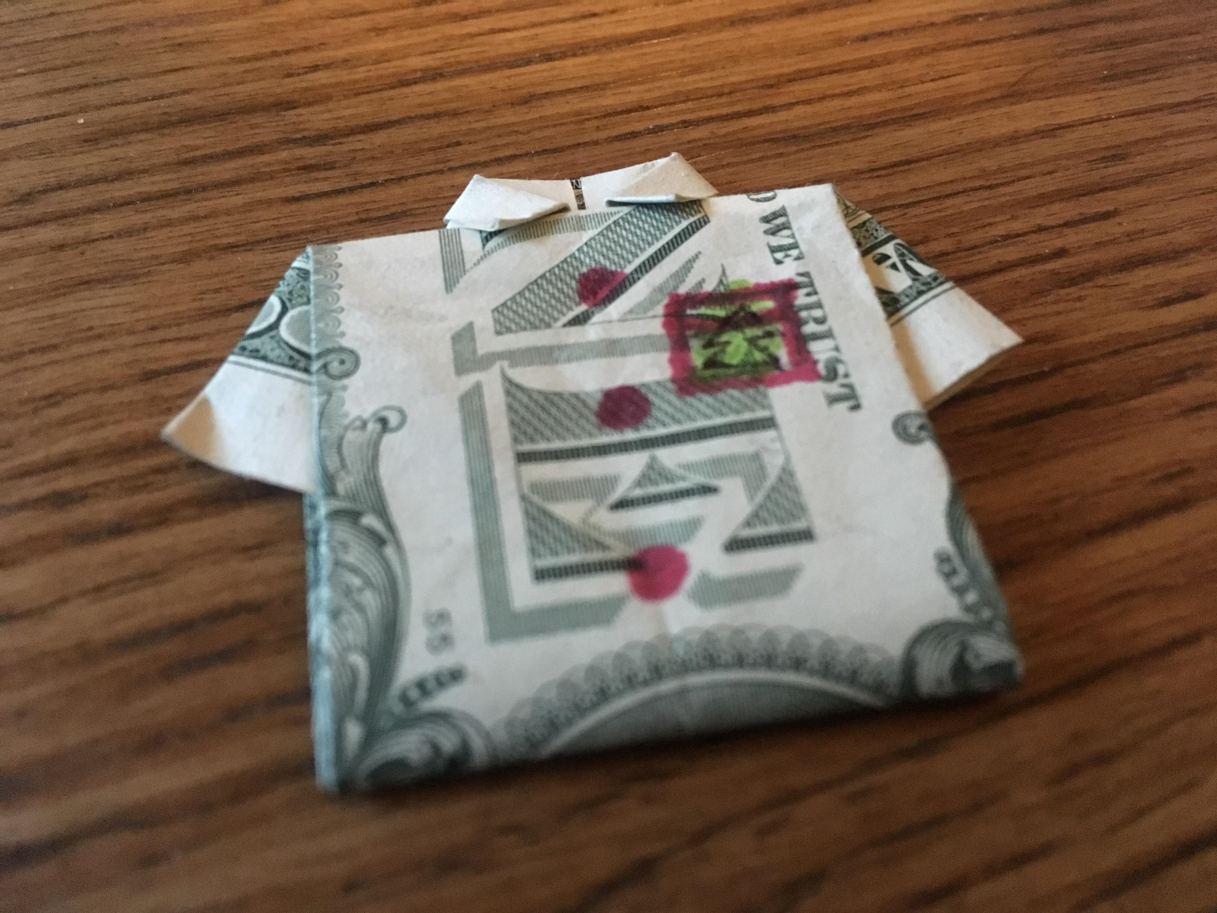 I found a dollar bill on the ground folded into a shirt Like For Real