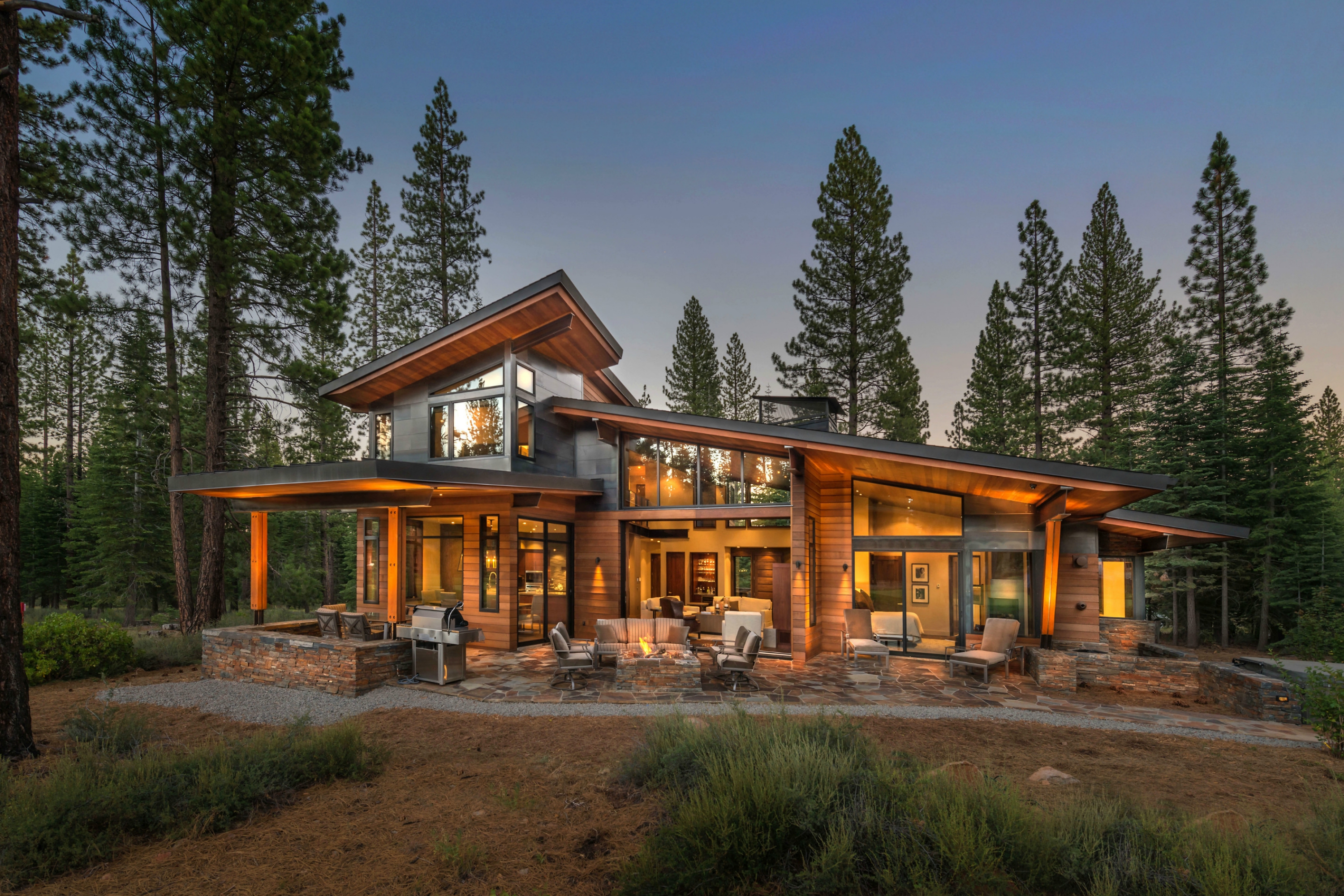 This modern residence in Truckee, CA features a mix of stone, steel and