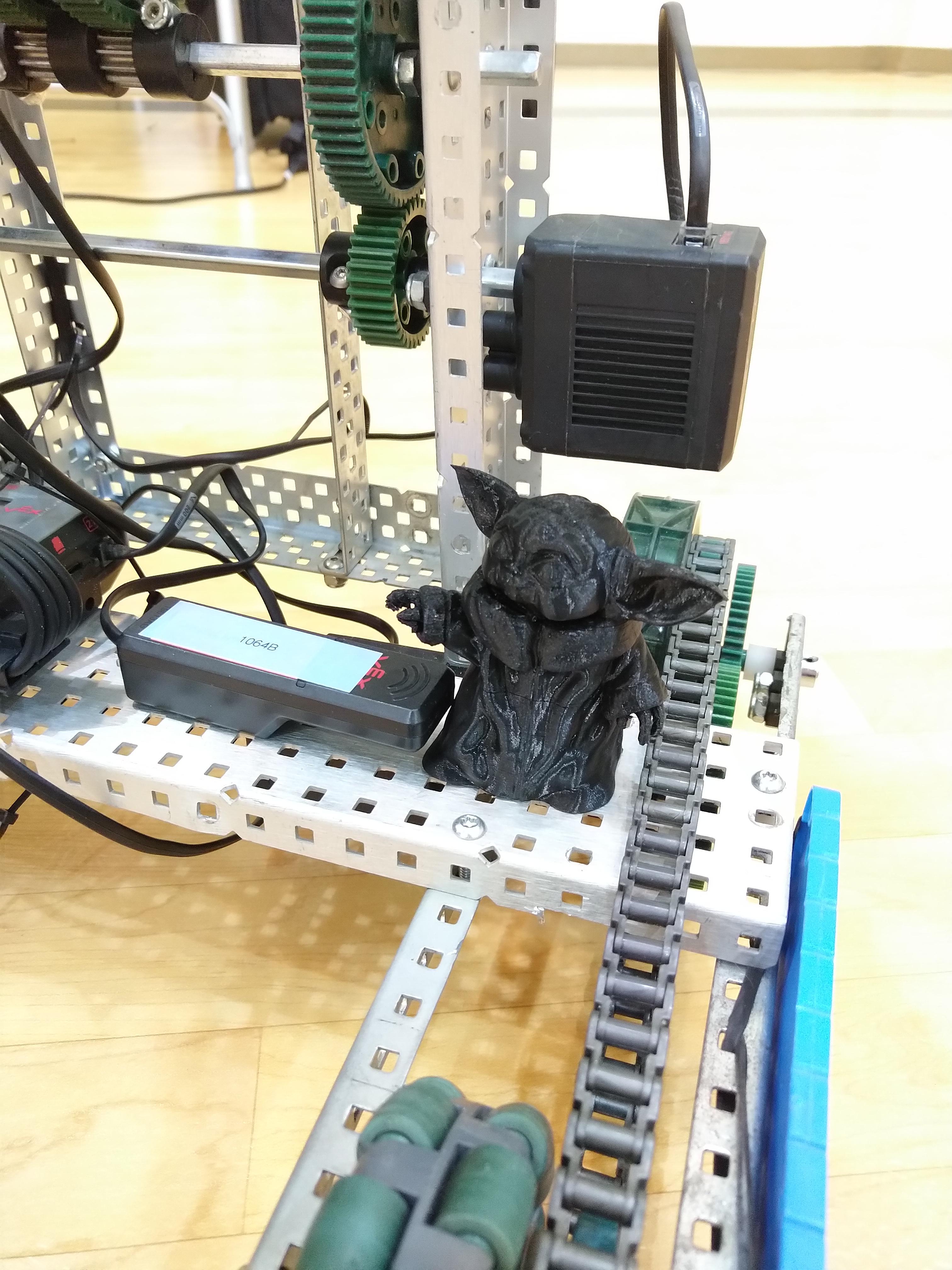 Attached a 3D printed Baby Yoda to our robot r/vex