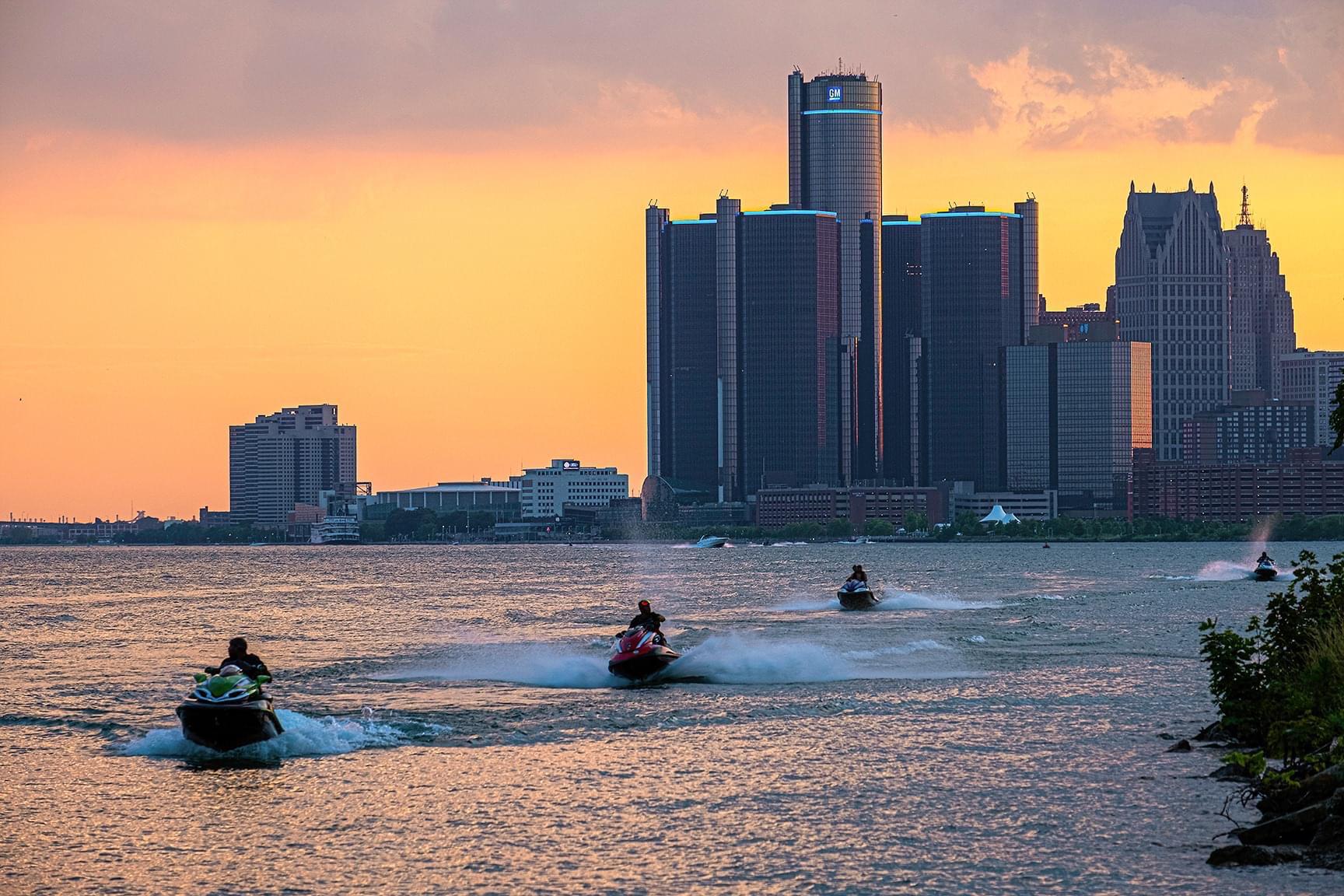 OC Jet skiers on the Detroit River just before sunset r/Detroit