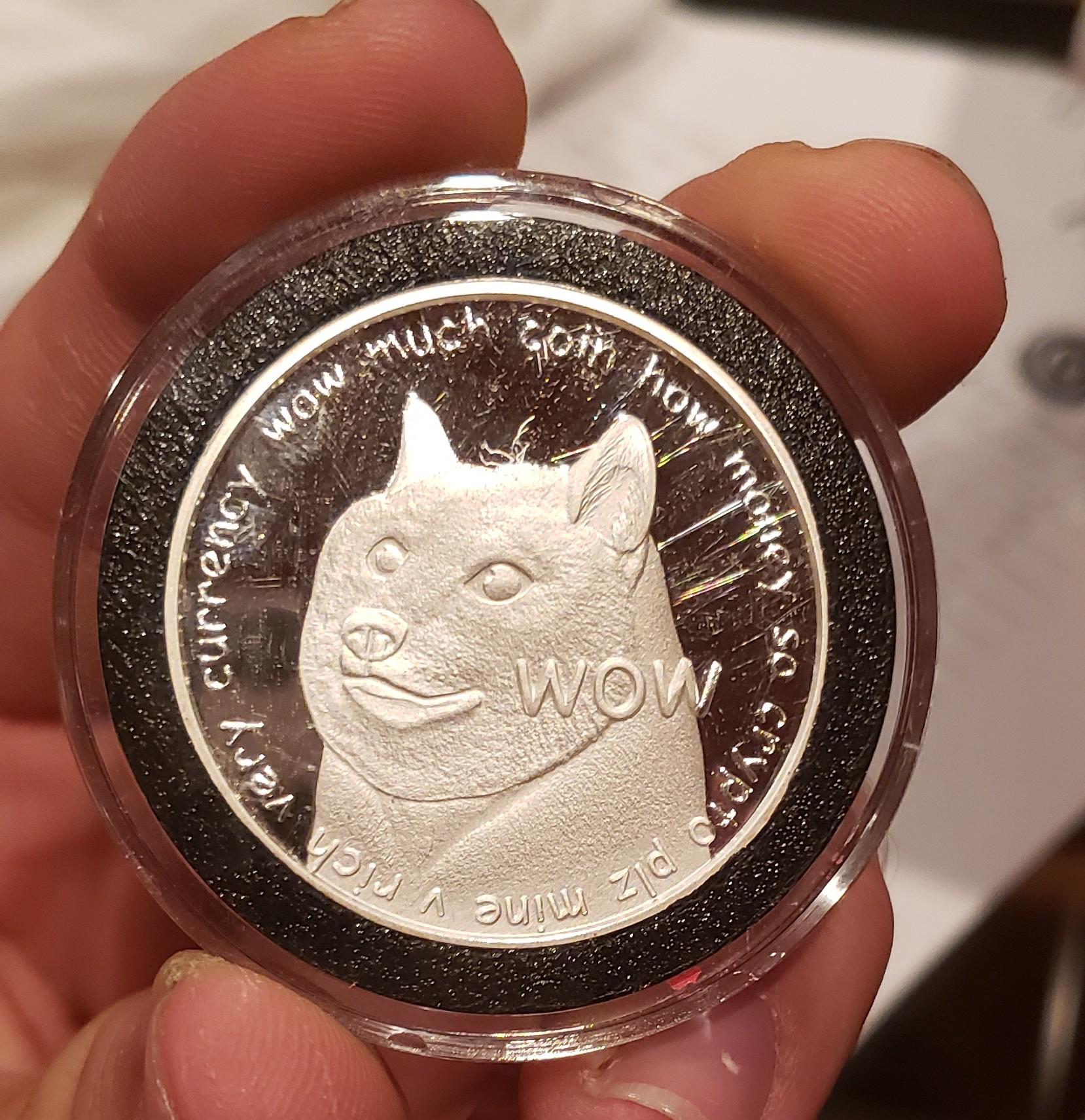 One of my favorite 1oz silver coins! Face value of 100 Dogecoin r