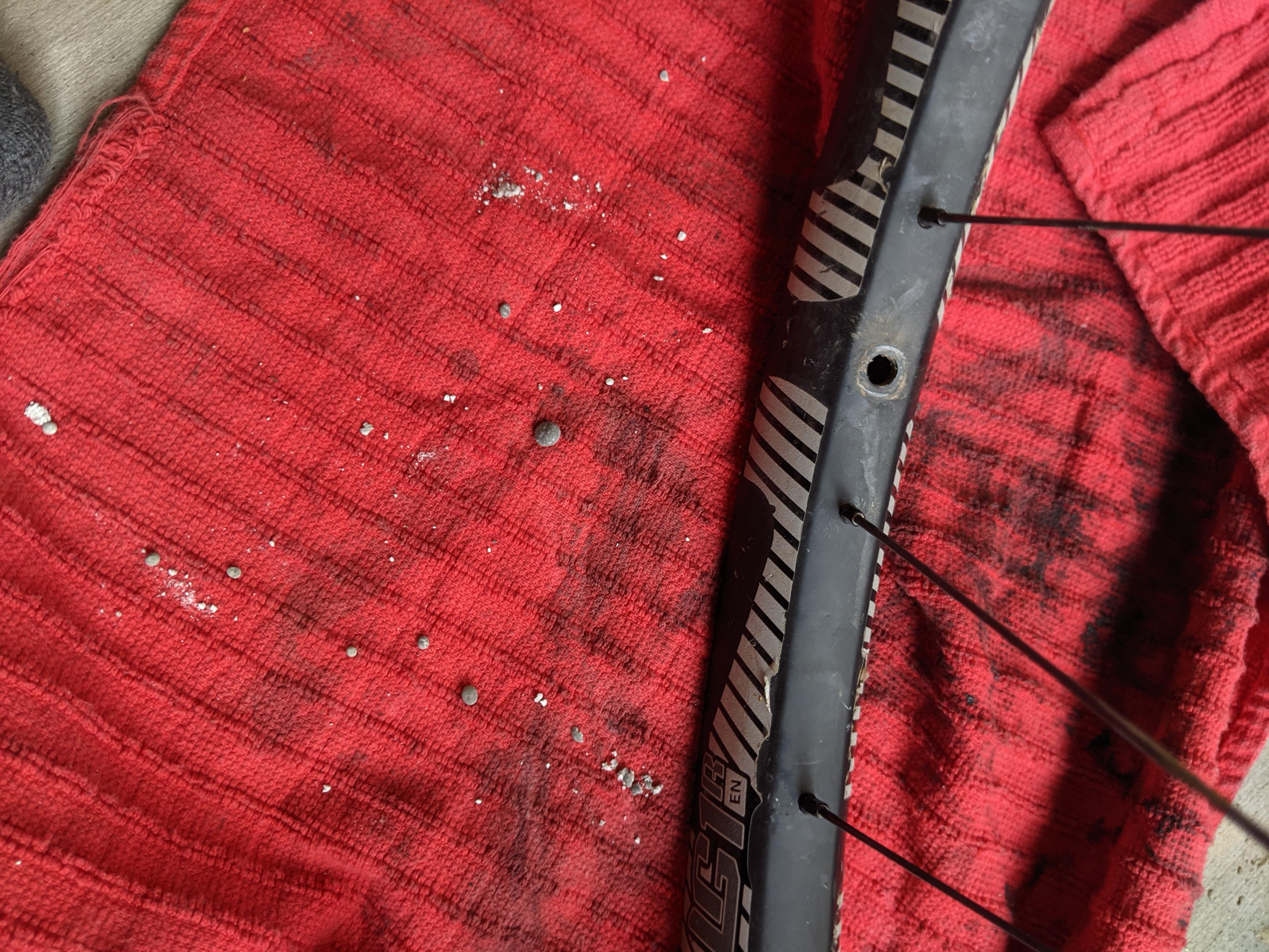 dirt/rock balls in rim. description in comments r/bikewrench