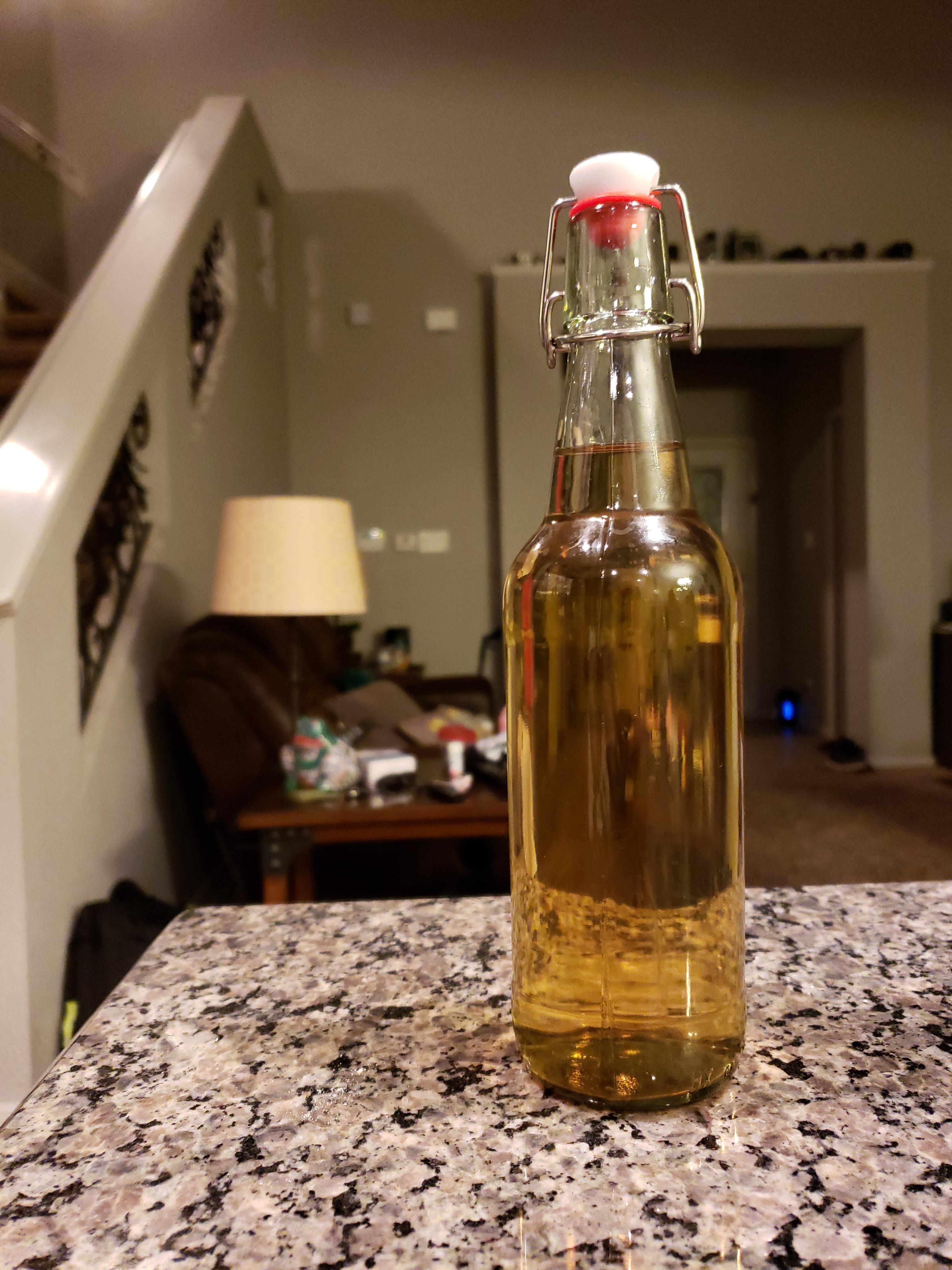 14 bottles of clear peach mead in the books r/mead