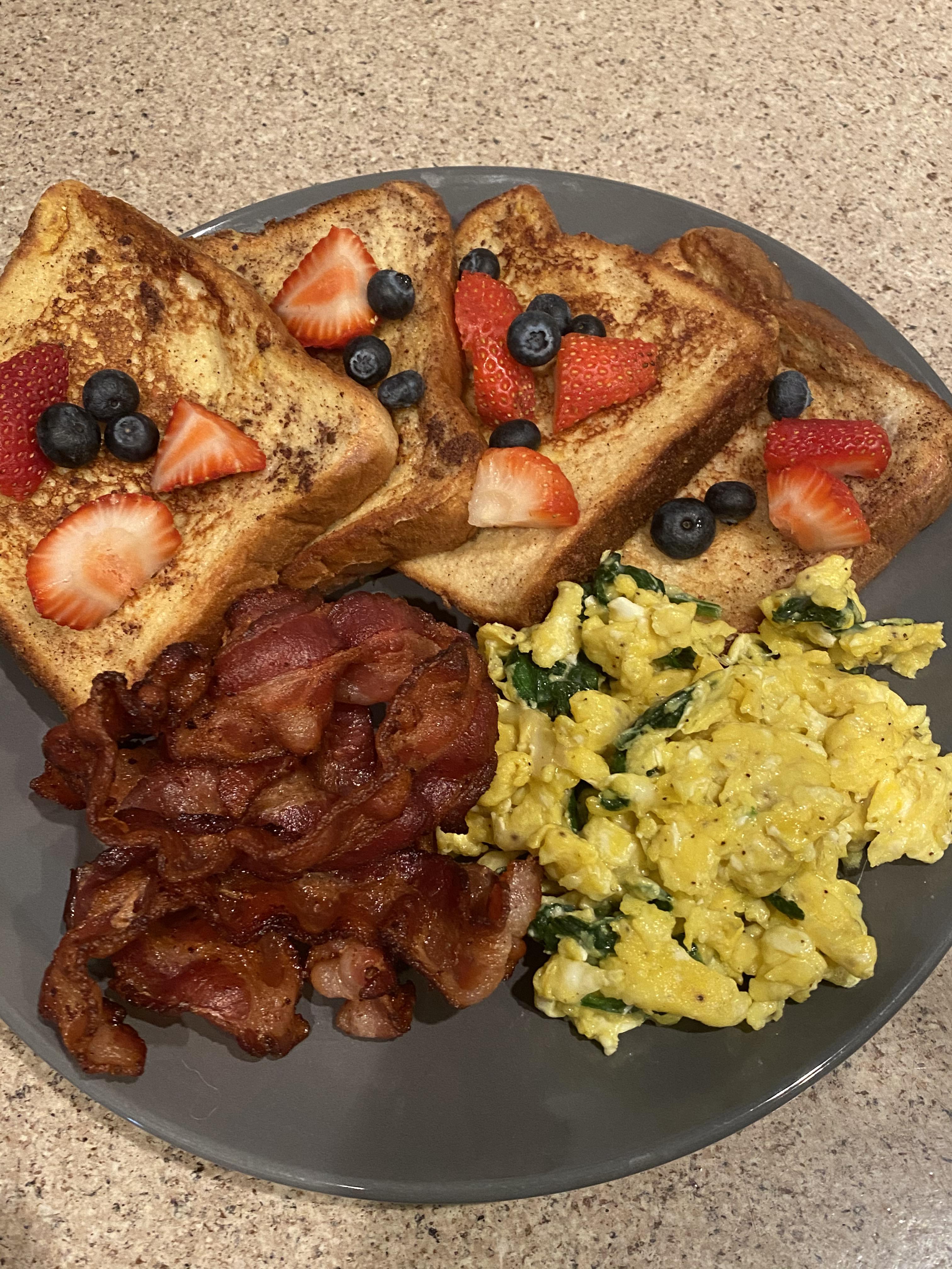 Breakfast! French toast, bacon and scrambled eggs w cheese and spinach