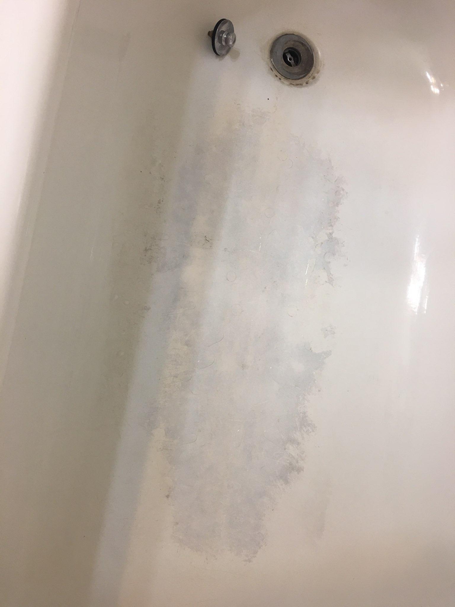 How do I clean this bath tub....tried cleaning with regular stuff. r