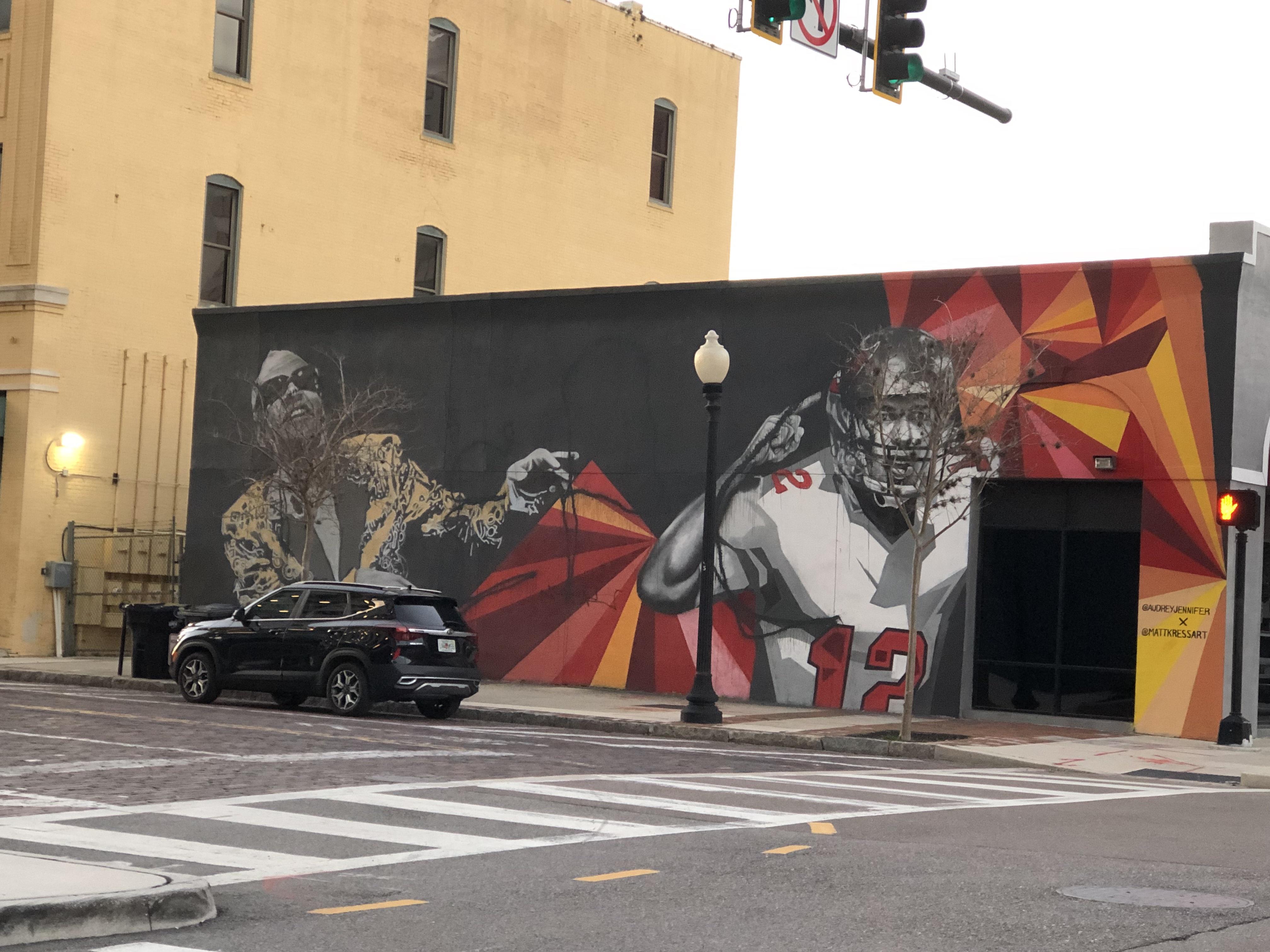 Mural in downtown Tampa honors quarterback and defensive coordinator