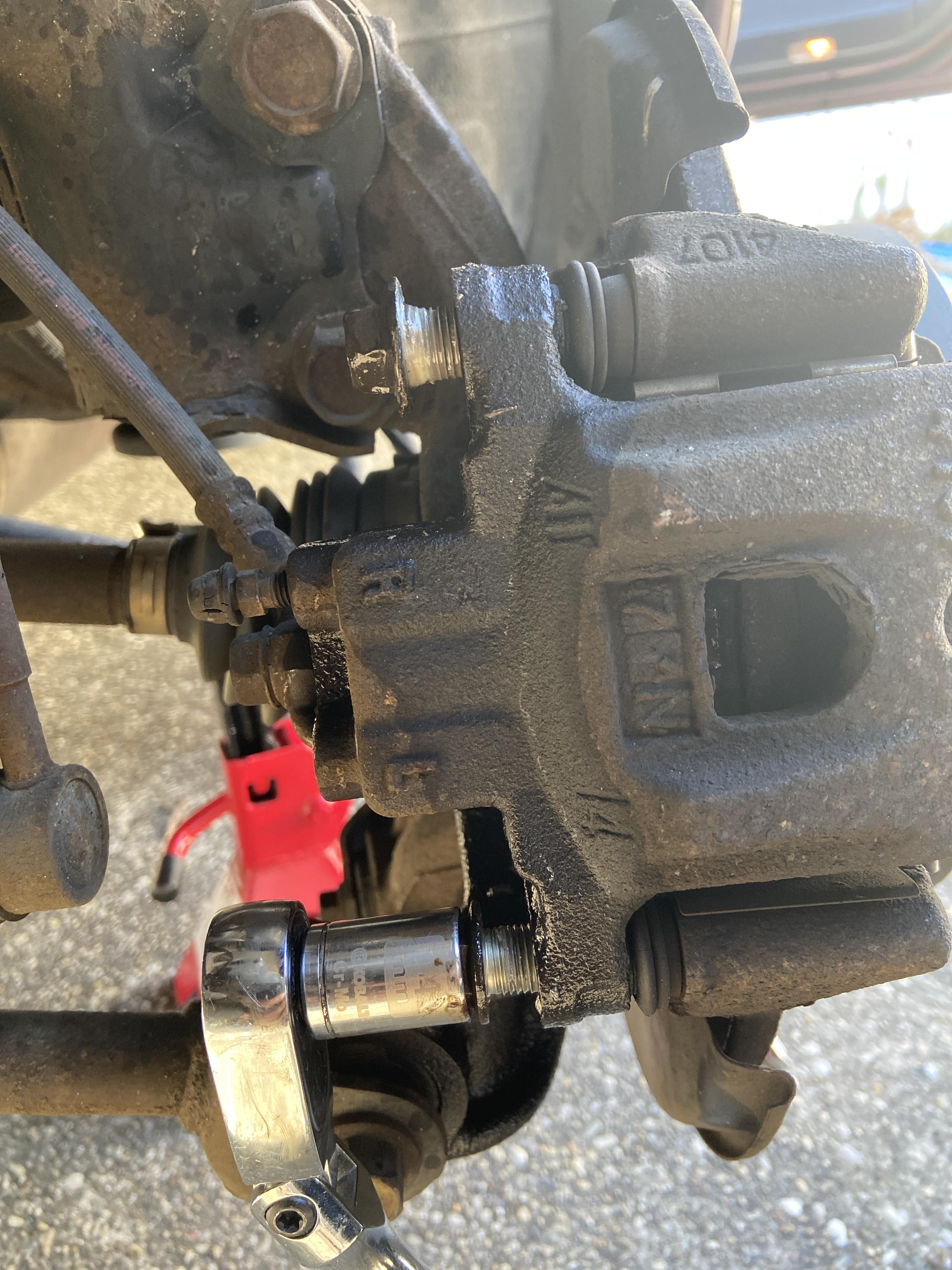 Please help. I can’t seem to remove the caliper slide bolts past this