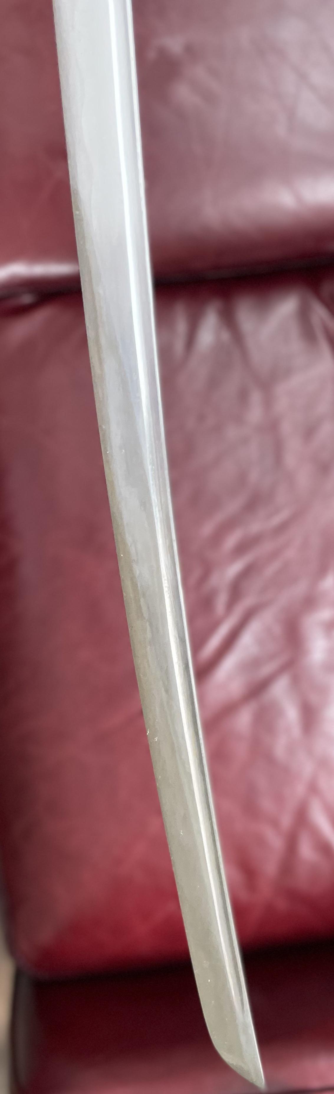 I need help figuring out how to fix my blade on my katana. I got orange