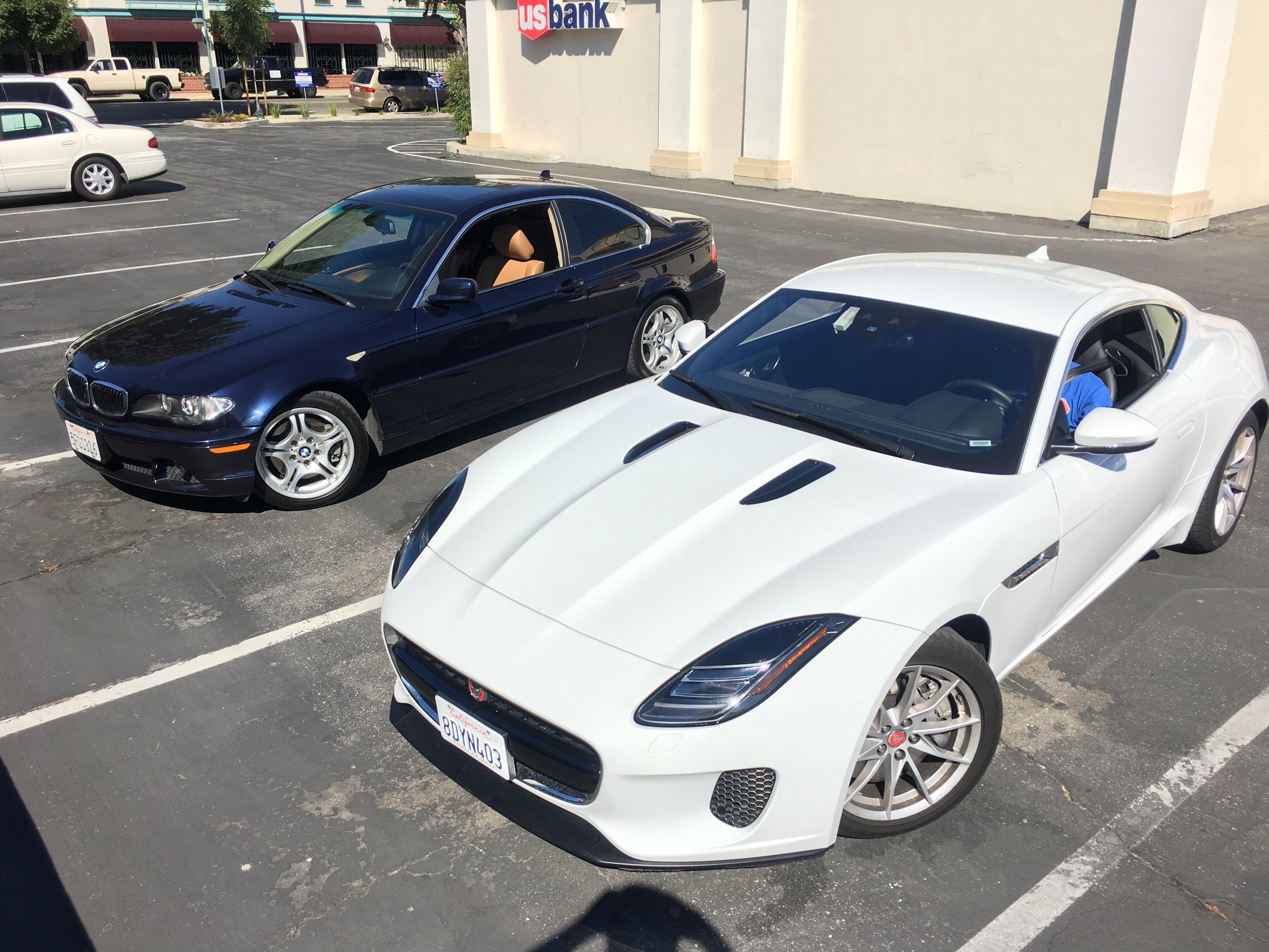 My new to me 330Ci next to our rental car for the trip r/Autos