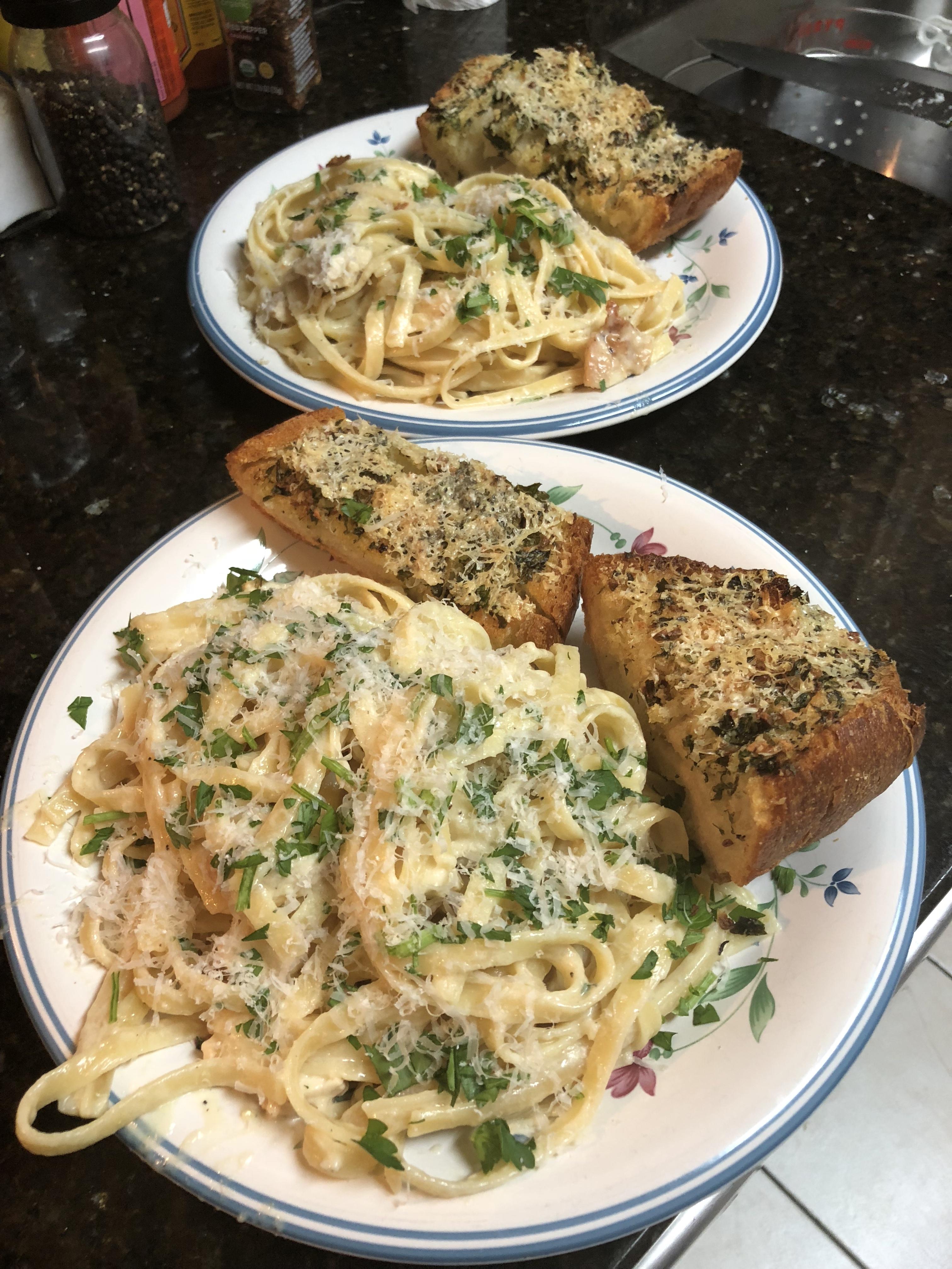 [Homemade] "light" Fettuccine Alfredo served with Garlic Bread r/food