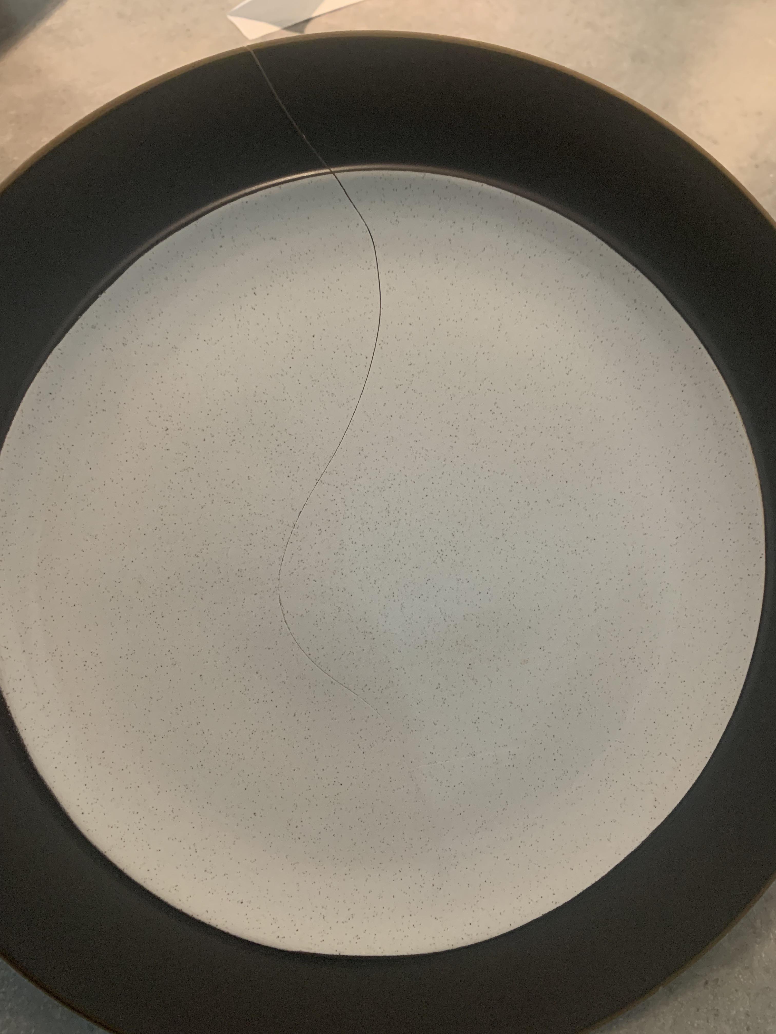Dinner plate that stopped spinning in the microwave got a wavy crack
