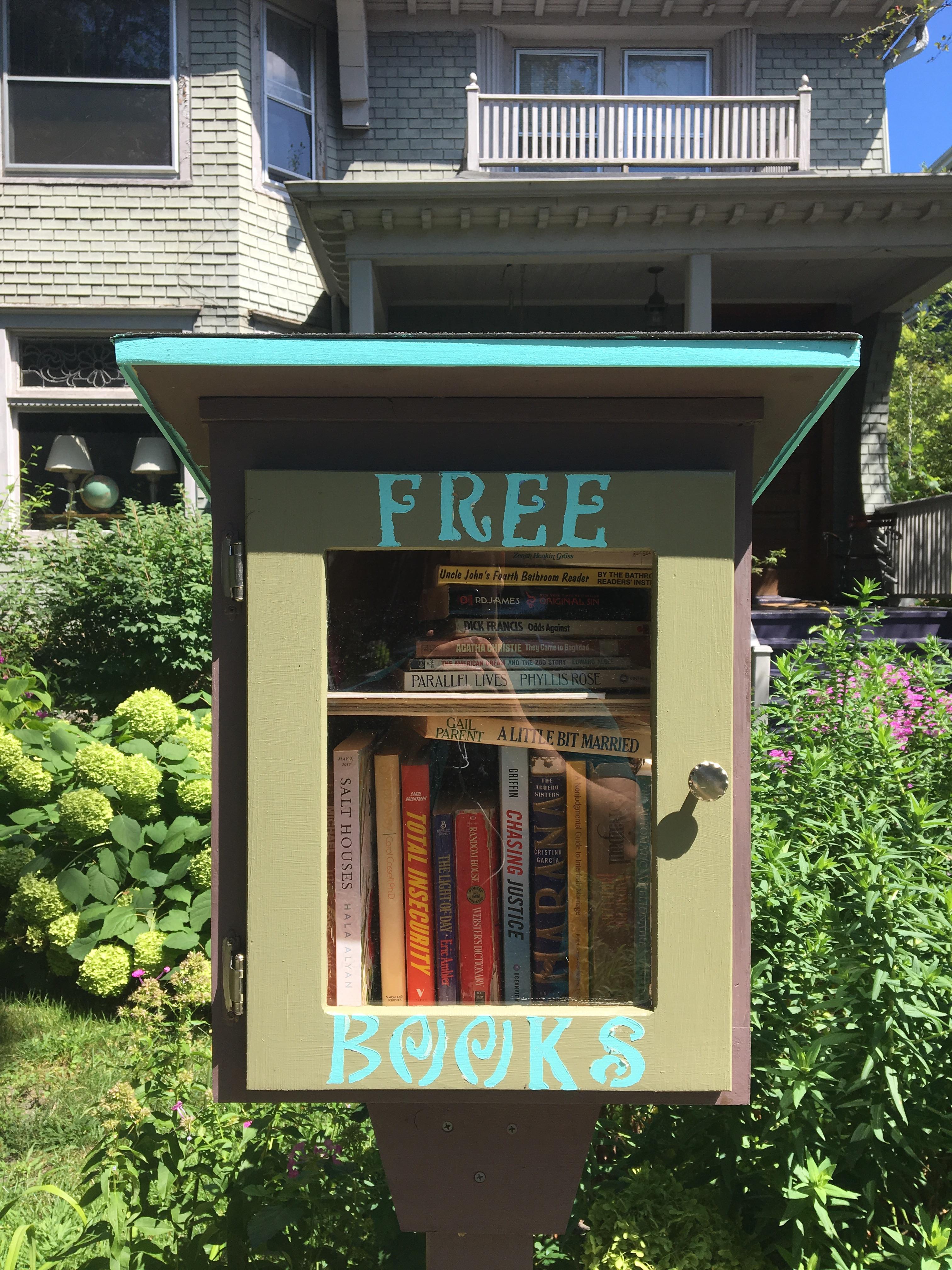 This house in my new neighborhood has a box filled with free books r