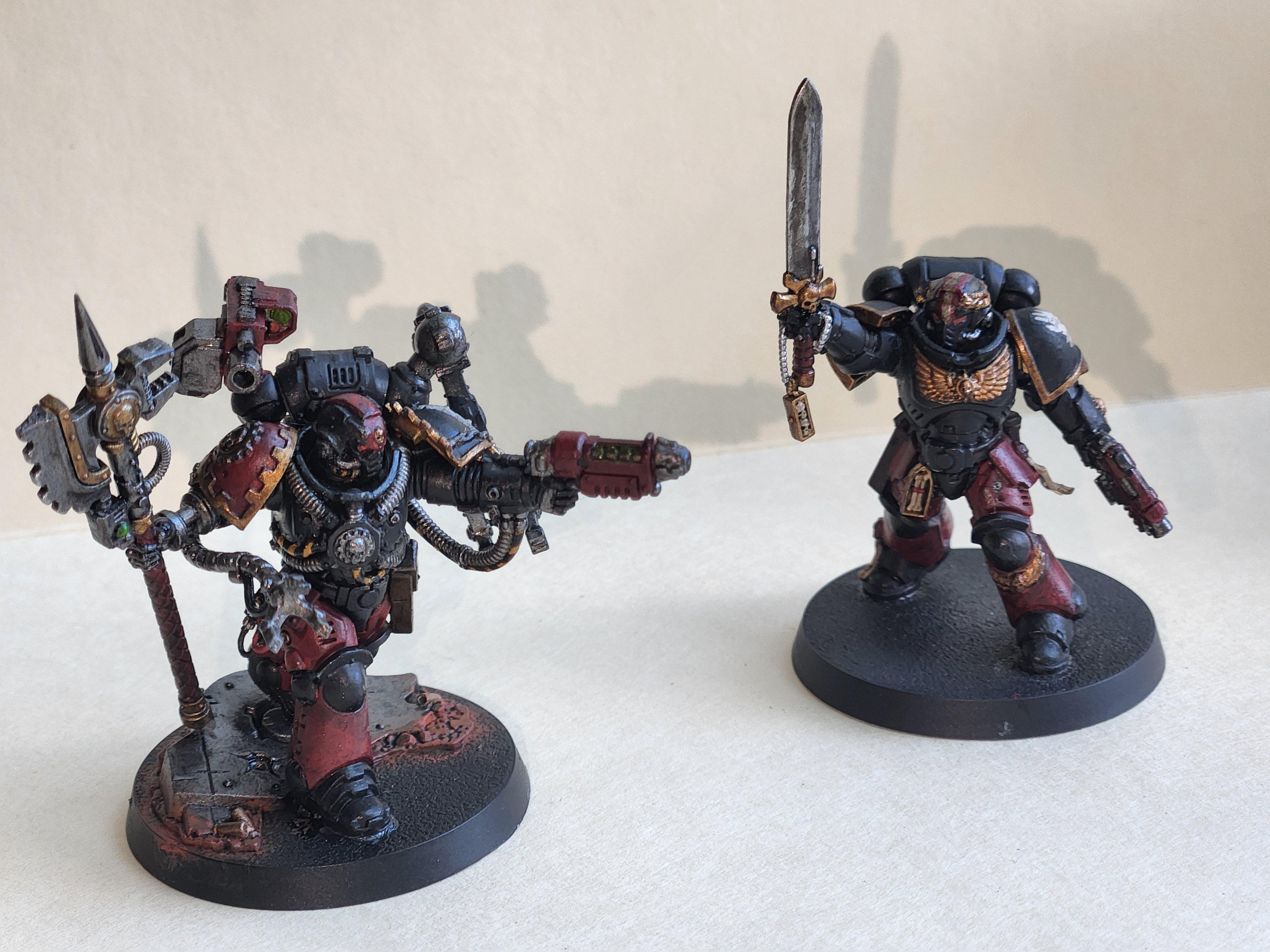 my first and second minis ever Iron Lords lieutenant and techmarine