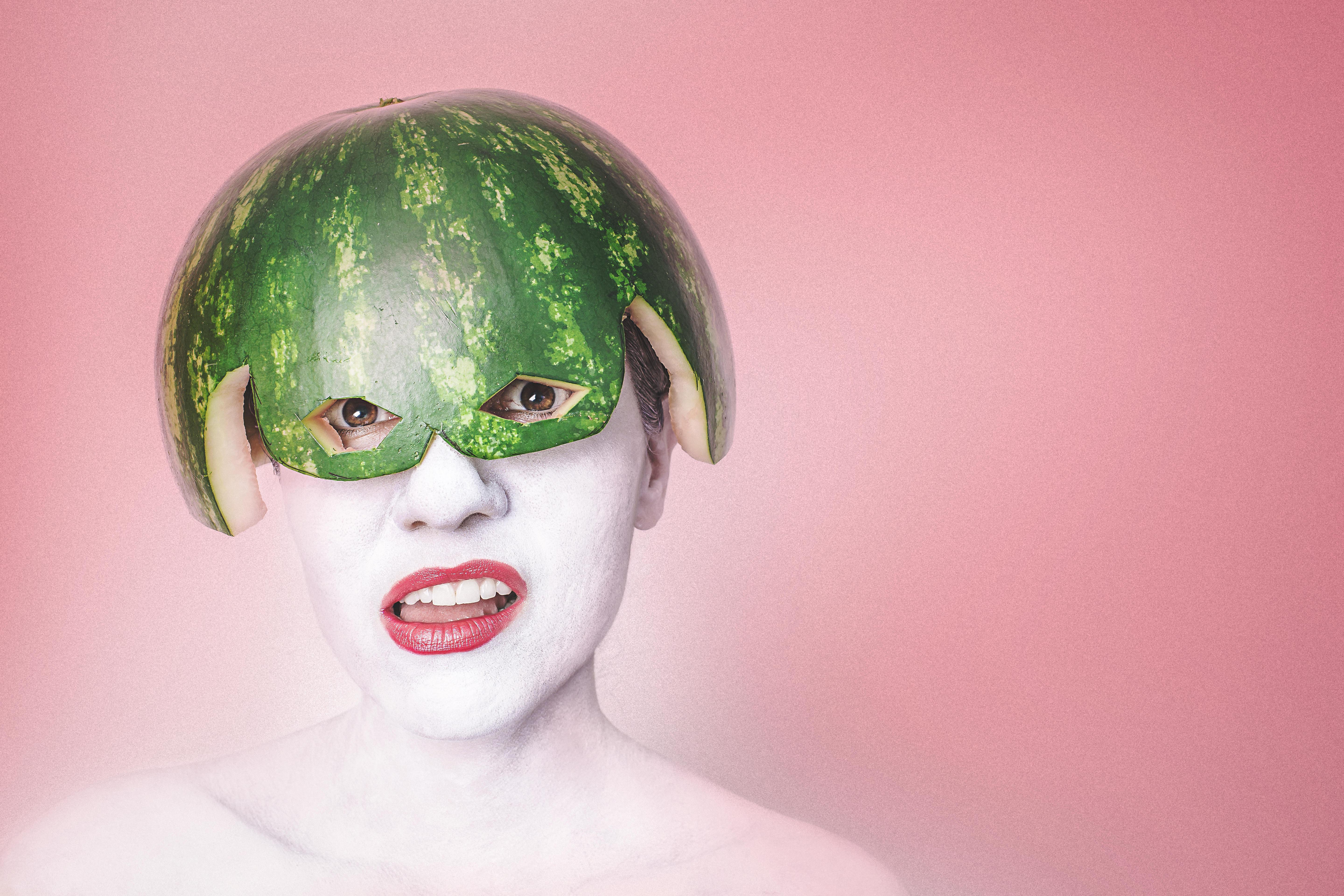 Watermelon worn on head with pink background r/wtfstockphotos