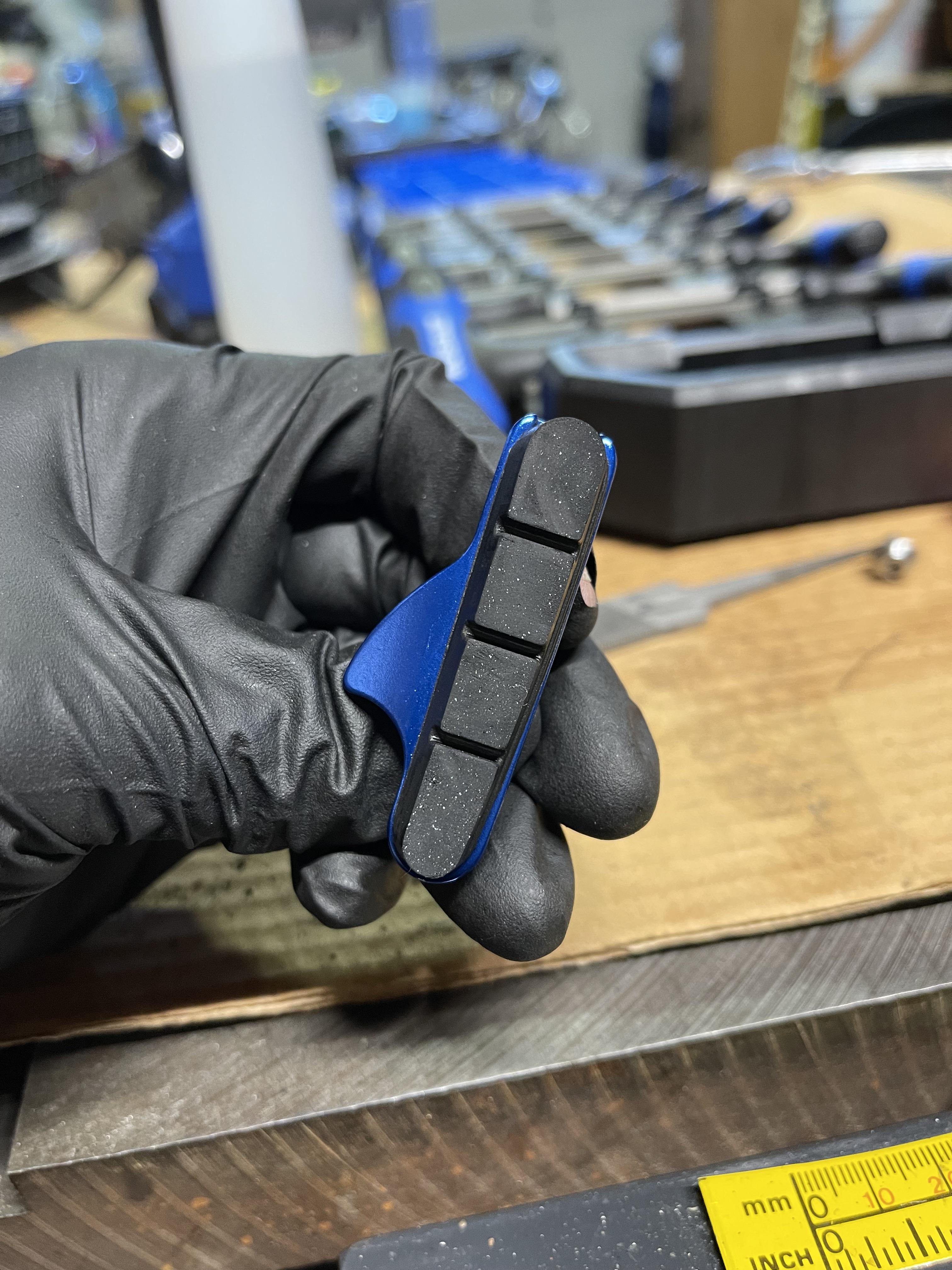 Should I be concerned about my brake pads? I tried filing and sanding. Can’t seem to get a clean