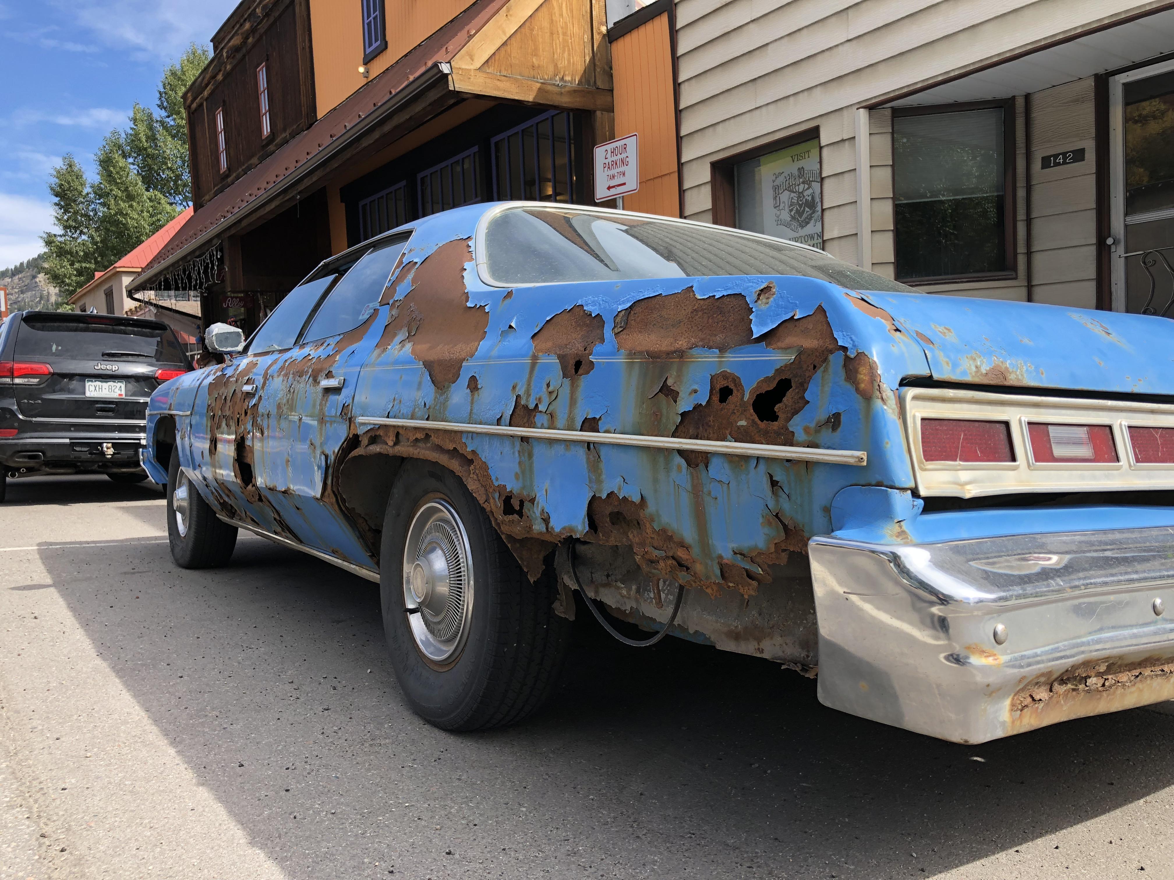 Rusty car still a daily driver in Colorado r/pics