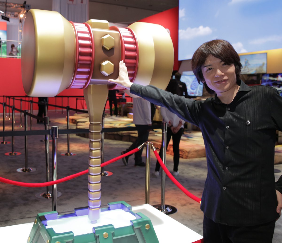 PsBattle Masahiro Sakurai next to a Golden Hammer from Wrecking Crew