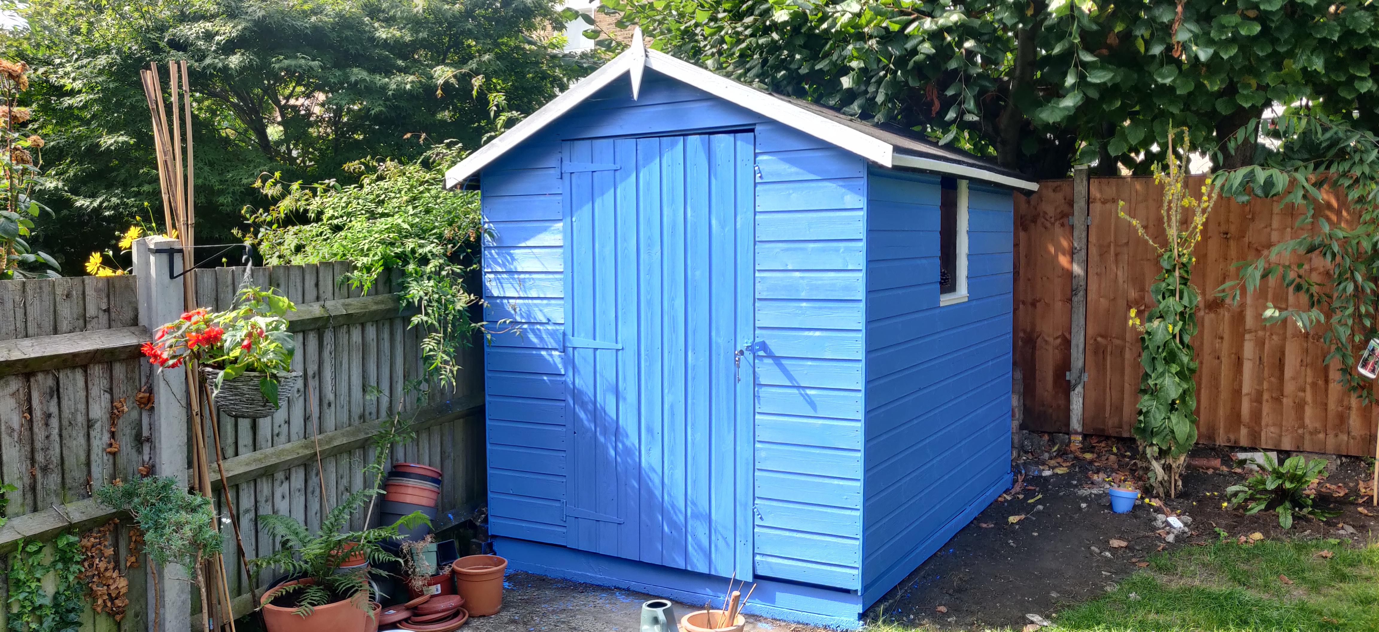Finished painting garden shed. Next step to trail some plants up and