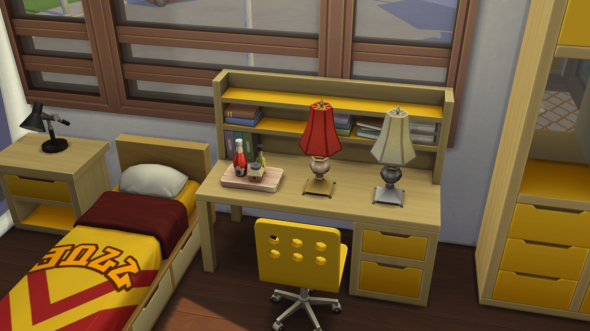 My sims roommate decorated his desk with two lamps and some condiments