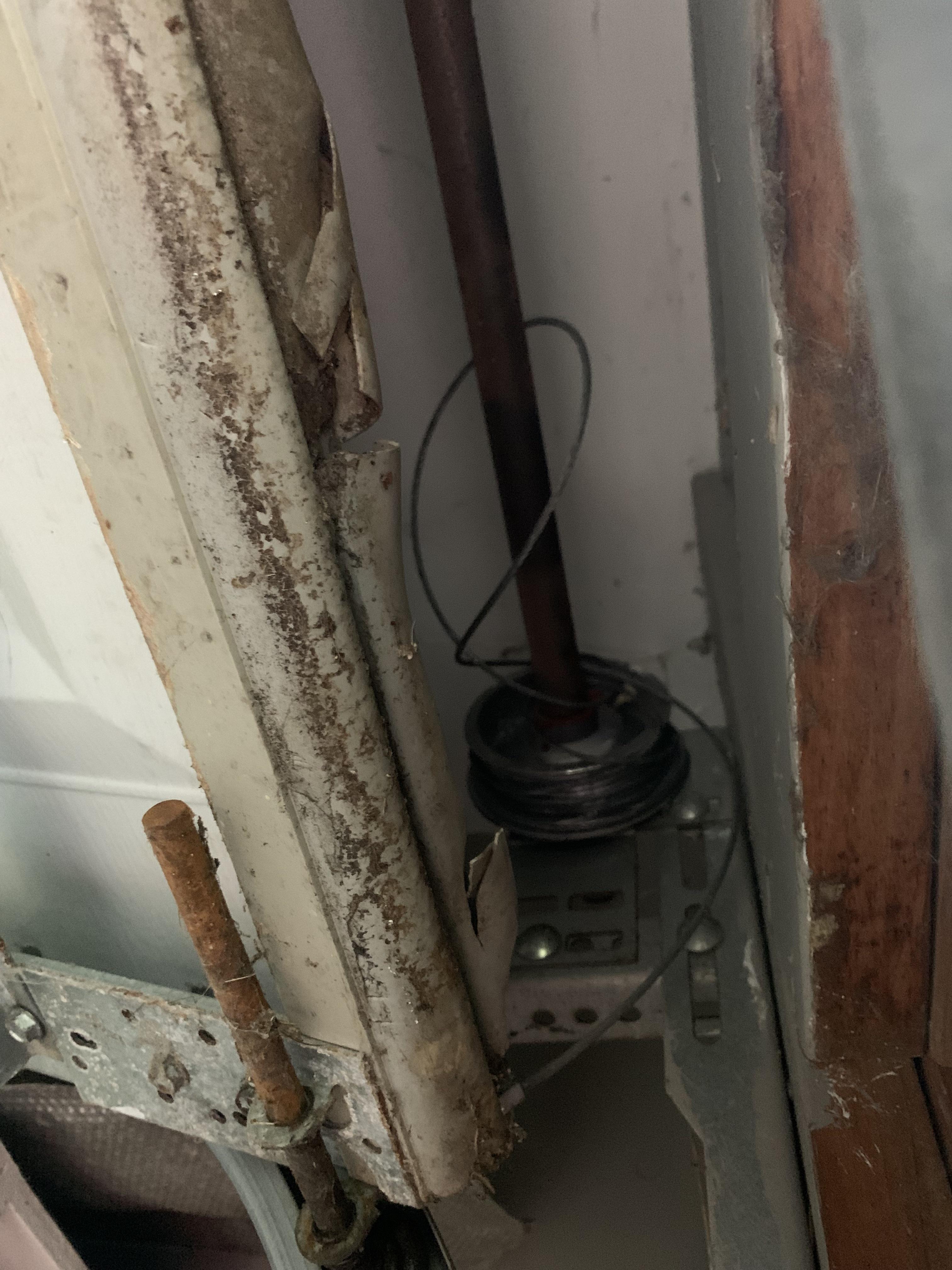 Garage door cable came off. When i wind it back up i cant get it back