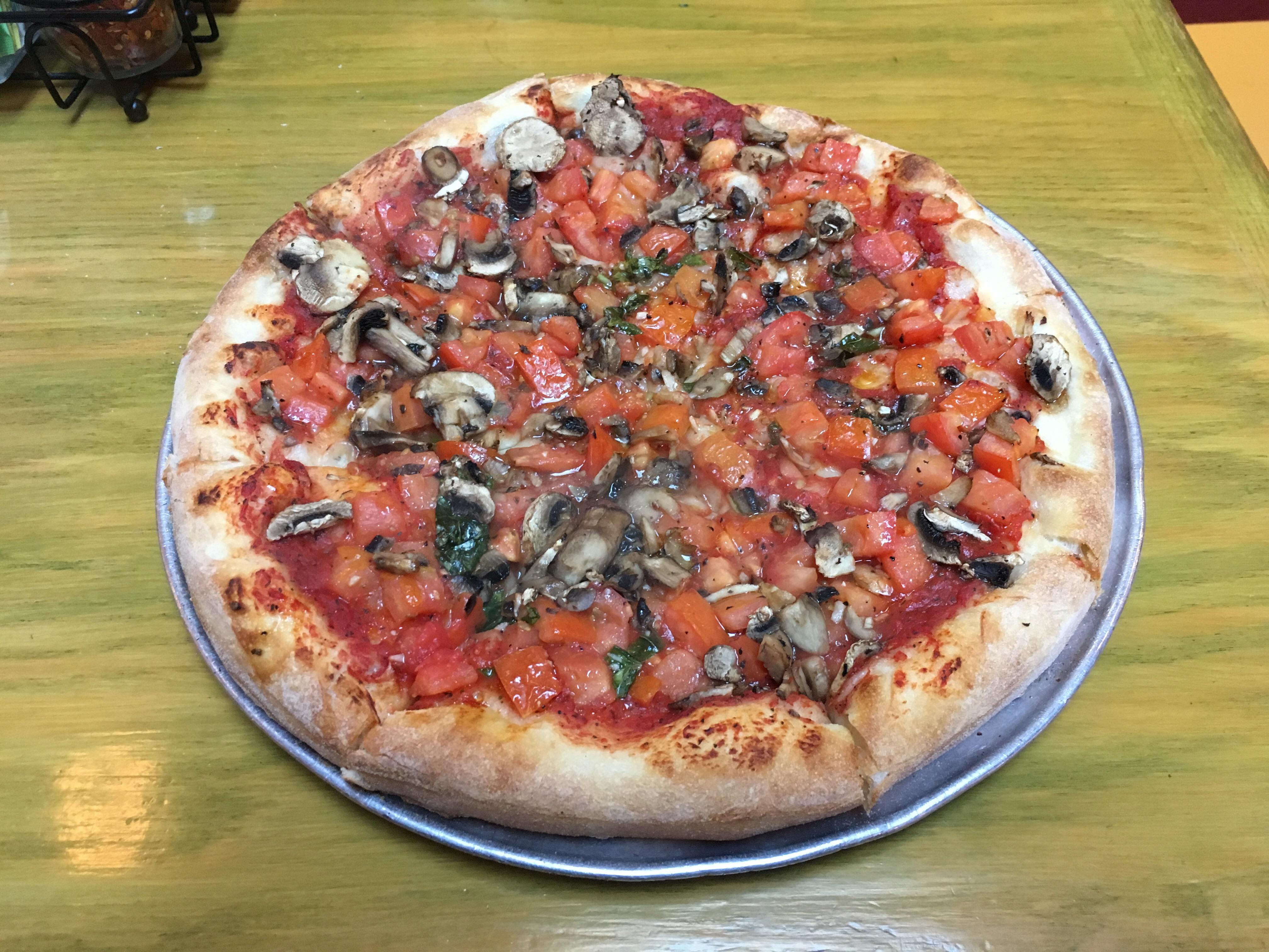 Tomato sauce, mushrooms, diced tomatoes, garlic, basil. Mary's Pizza Shack, Sonoma, California