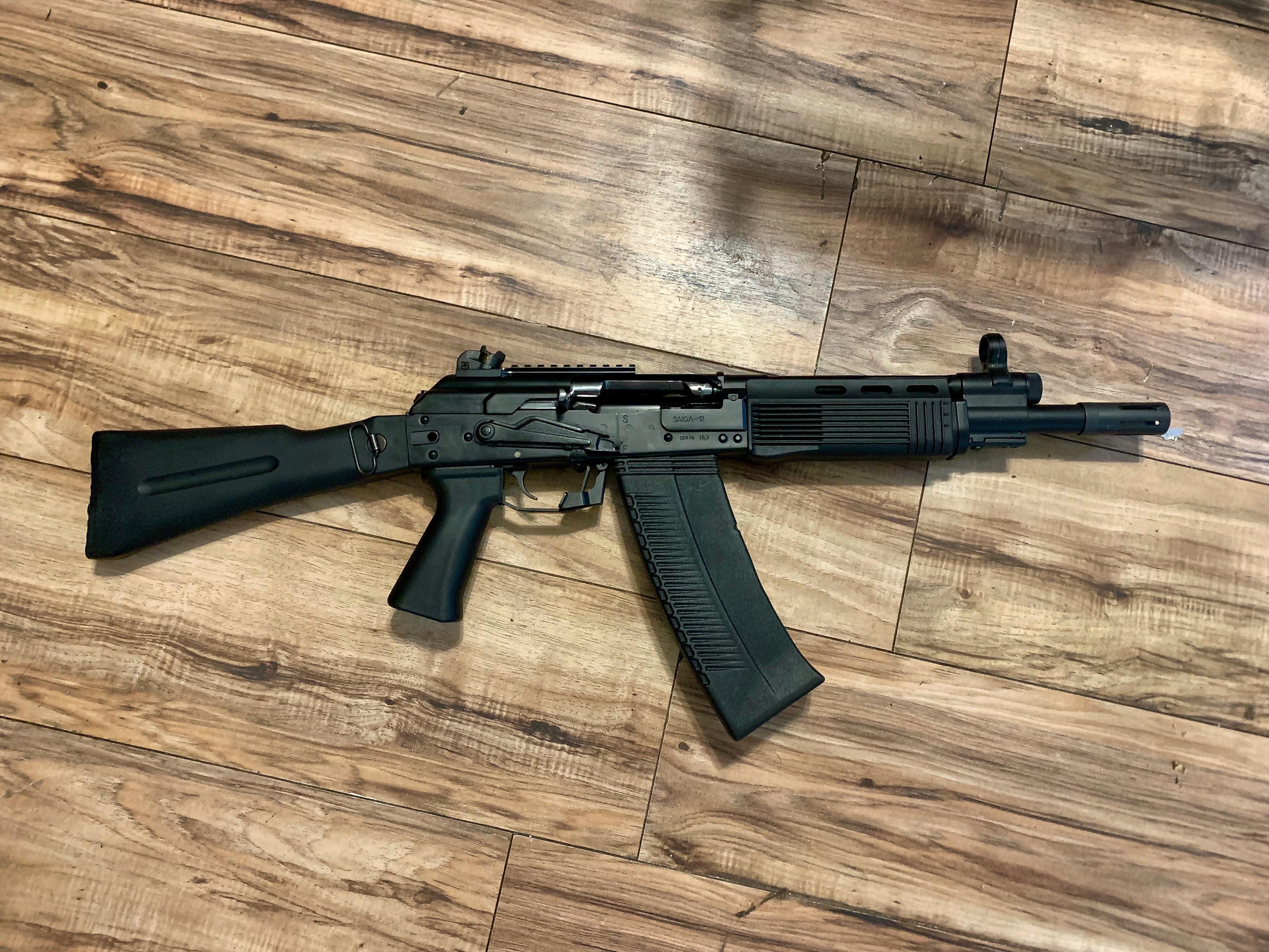 F O L D E R * F R I D A Y. Saiga 12 cut down to 12”, HK aperture sights