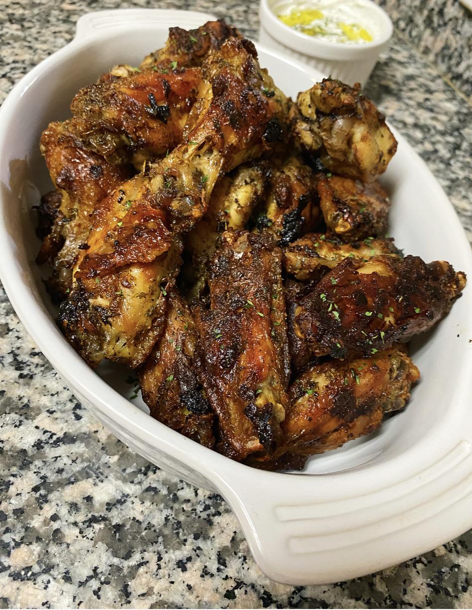 Greek Chicken Wings with Tzatziki Sauce. Served with Homemade Naan and