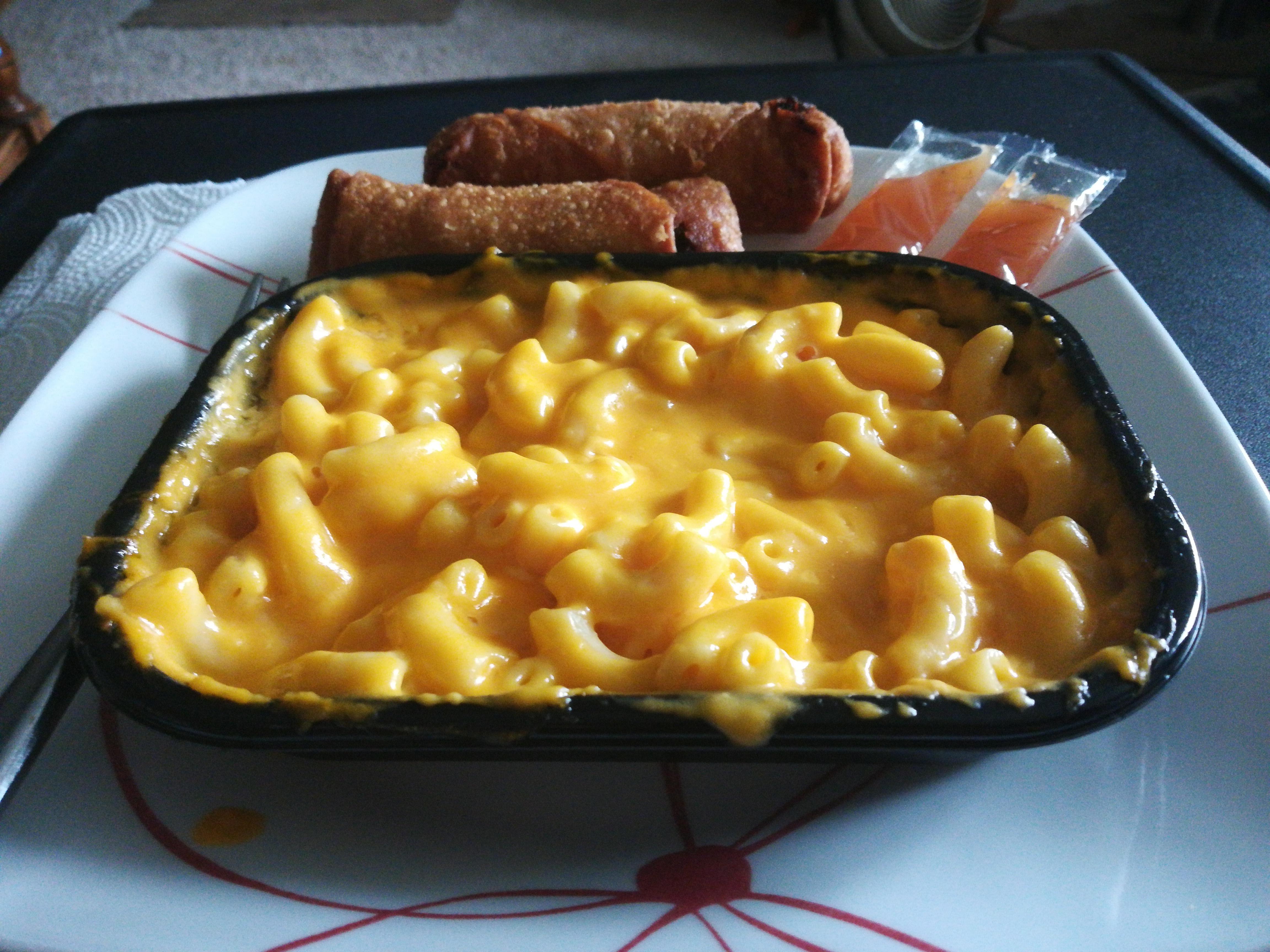 Multicultural meal Mac & cheese (with extra cheese and butter) and fried egg rolls Multicultural meal Mac & cheese (with extra cheese and butter) and fried egg rolls